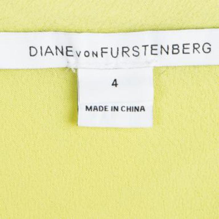The eponymous label Diane Von Furstenberg brings to you this lovely drop-waist Gagon dress for all your summer outings. The yellow sleeveless dress is made of a viscose and rayon blend and has an asymmetrical silhouette. It features a V-neckline