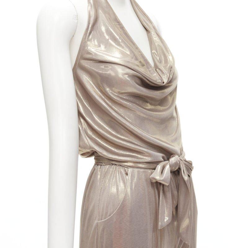 DIANE VON FUSTENBERG Carolette liquid metal gold halter backless jumpsuit S
Reference: ANWU/A00665
Brand: Diane von Furstenberg
Model: Carolette
Material: Feels like viscose
Color: Gold
Pattern: Solid
Closure: Elasticated
Extra Details: Halter tie