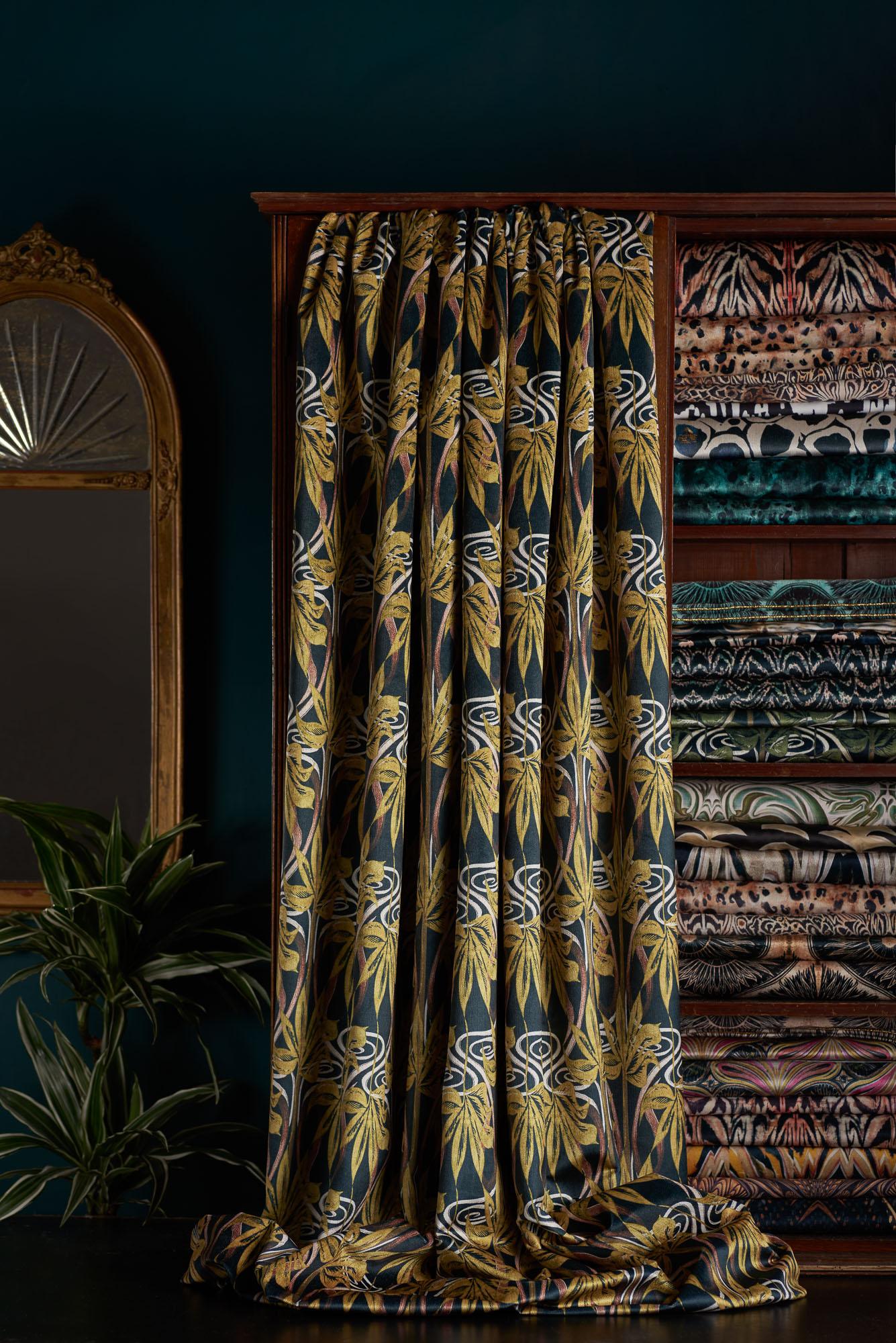 Dianne is a sandwiched print of two of Anna’s linocuts, pieced together to form a lyrical, jungle-like design which lends well to maximalist schemes. With a hint of Art Nouveau influence, this vibrant gold and reds colourway sits well with