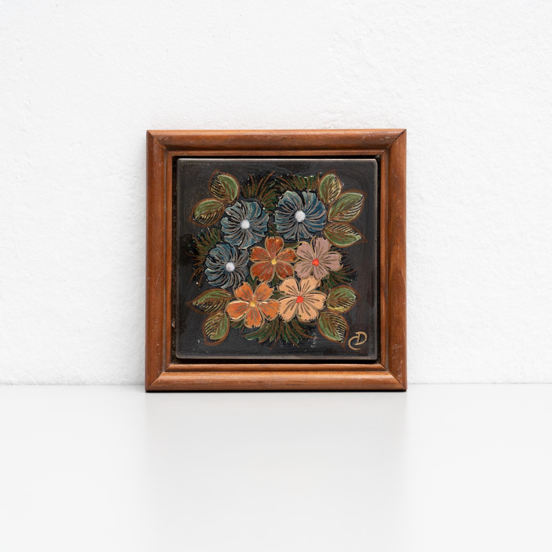 Ceramic hand painted artwork of a floral design by Catalan artist Diaz Costa, circa 1960.  Framed. Signed.    In original condition, with minor wear consistent of age and use, preserving a beautiul patina.