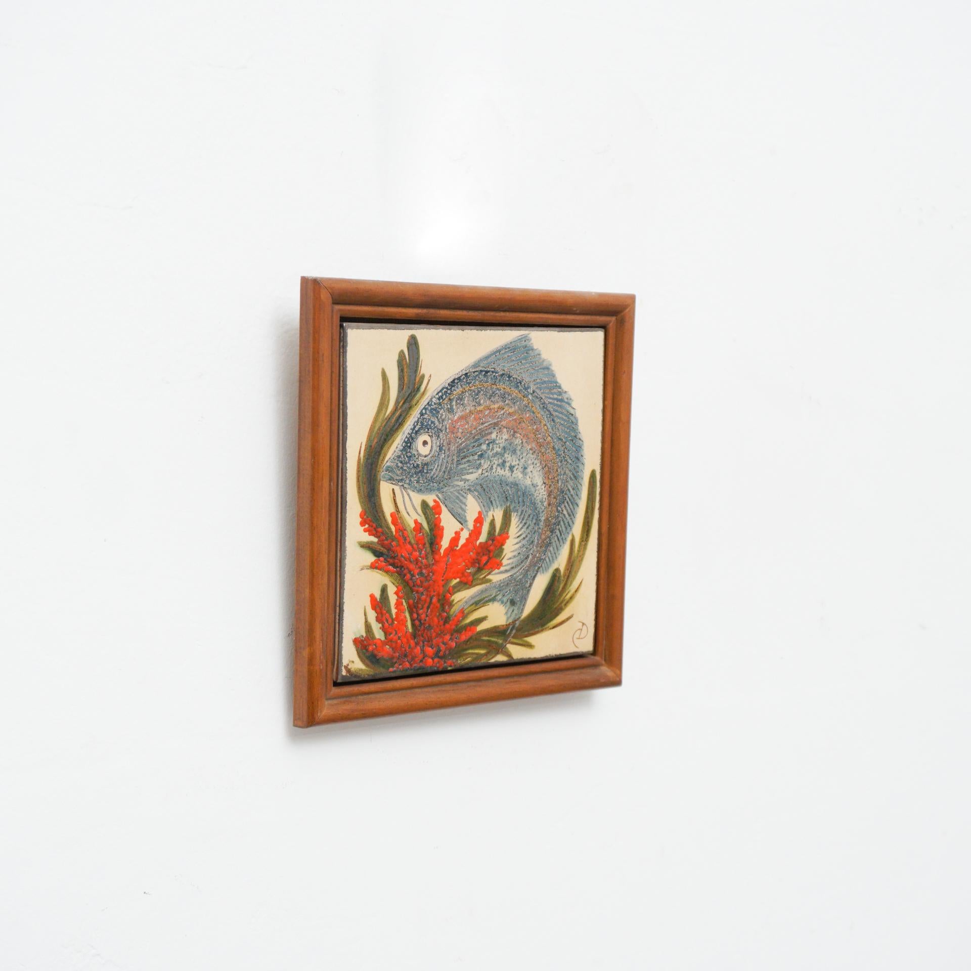 Mid Century Modern Ceramic Hand Painted Artwork of a fish by Catalan artist Diaz Costa, circa 1960.
Framed.

In original condition, with minor wear consistent of age and use, preserving a beautiul patina.