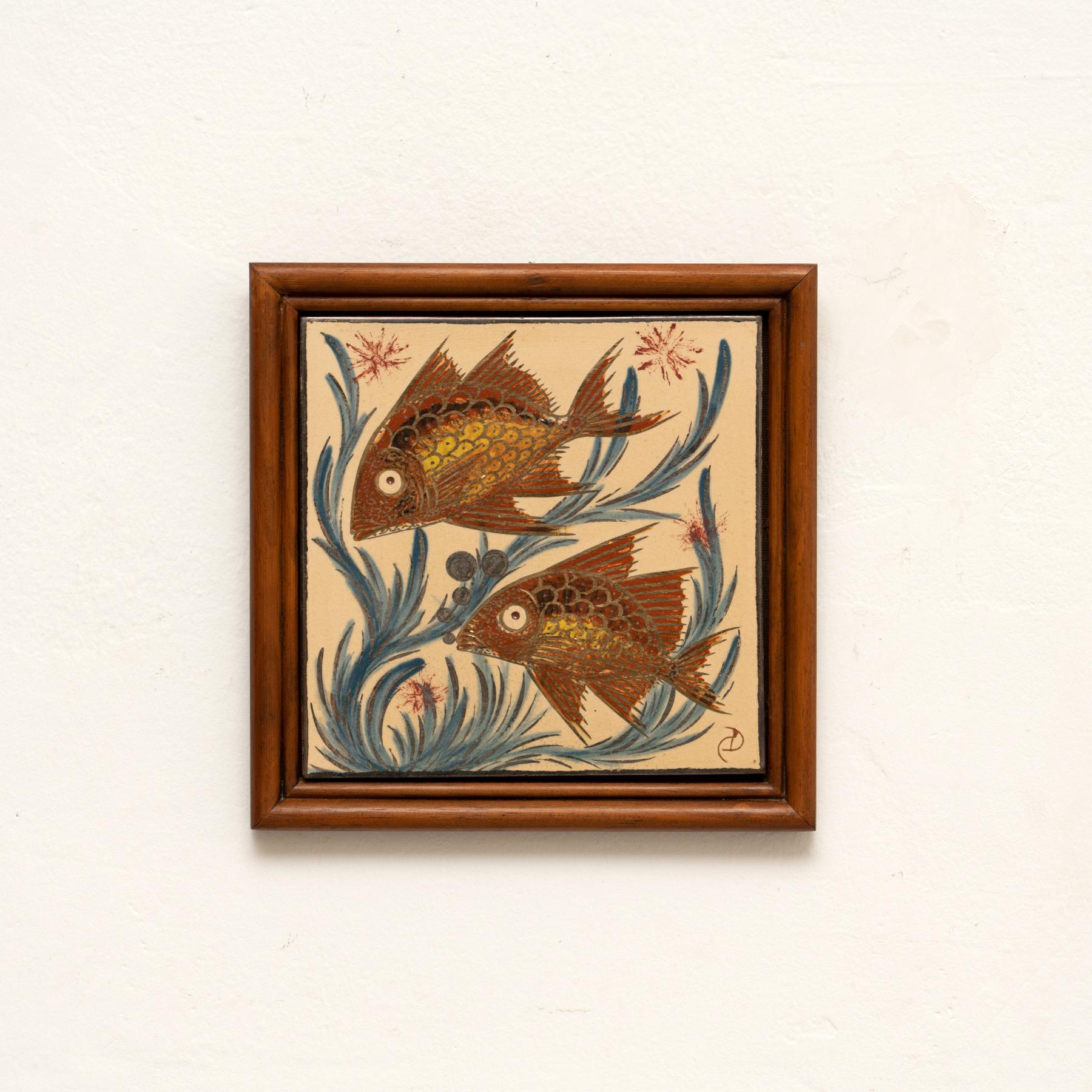 Ceramic hand painted artwork of TWO fishes design by Catalan artist Diaz Costa, circa 1960.
Framed. Signed.

In original condition, with minor wear consistent of age and use, preserving a beautiul patina.