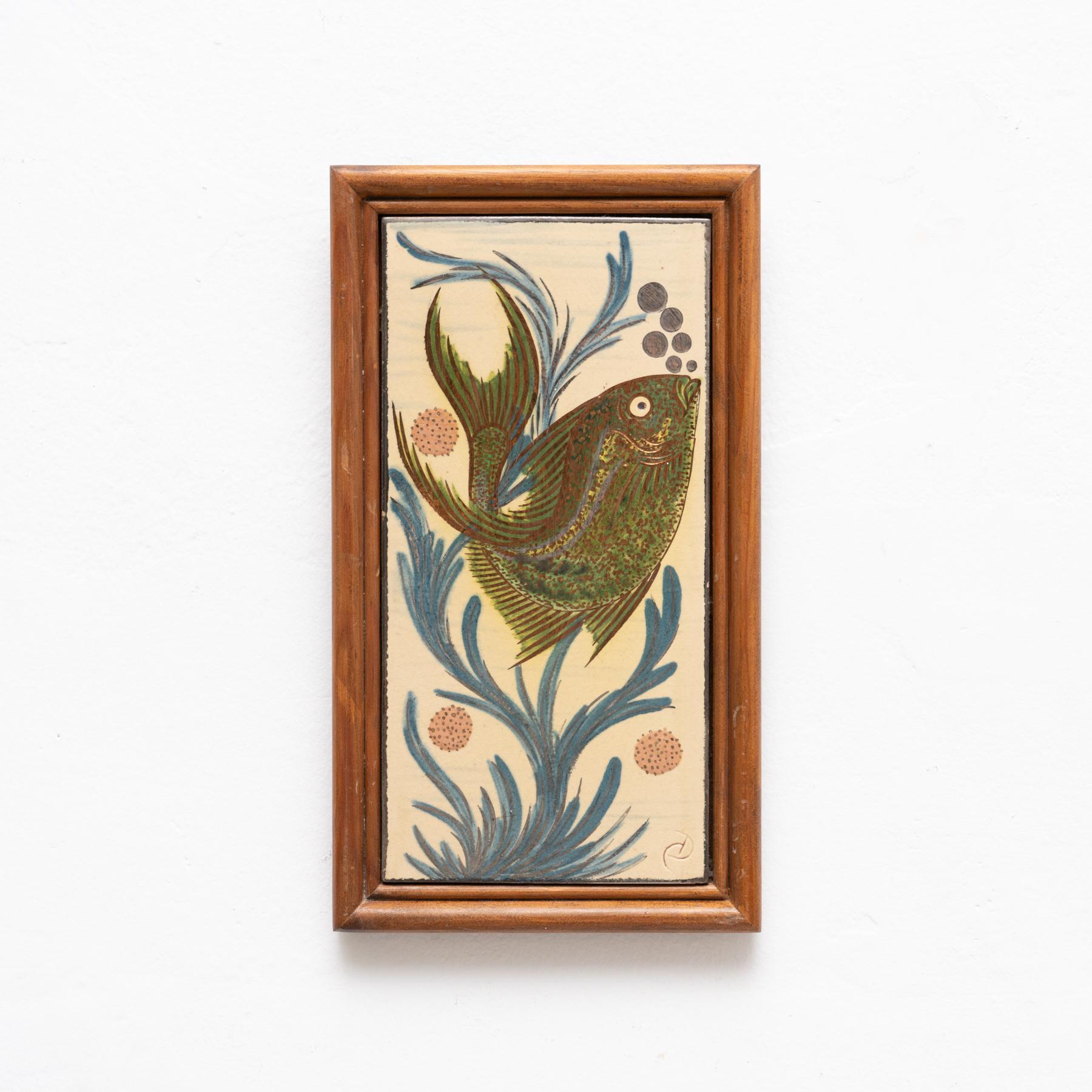 Ceramic hand painted artwork of a fish by Catalan artist Diaz Costa, circa 1960.  Framed. Signed.    In original condition, with minor wear consistent of age and use, preserving a beautiul patina.