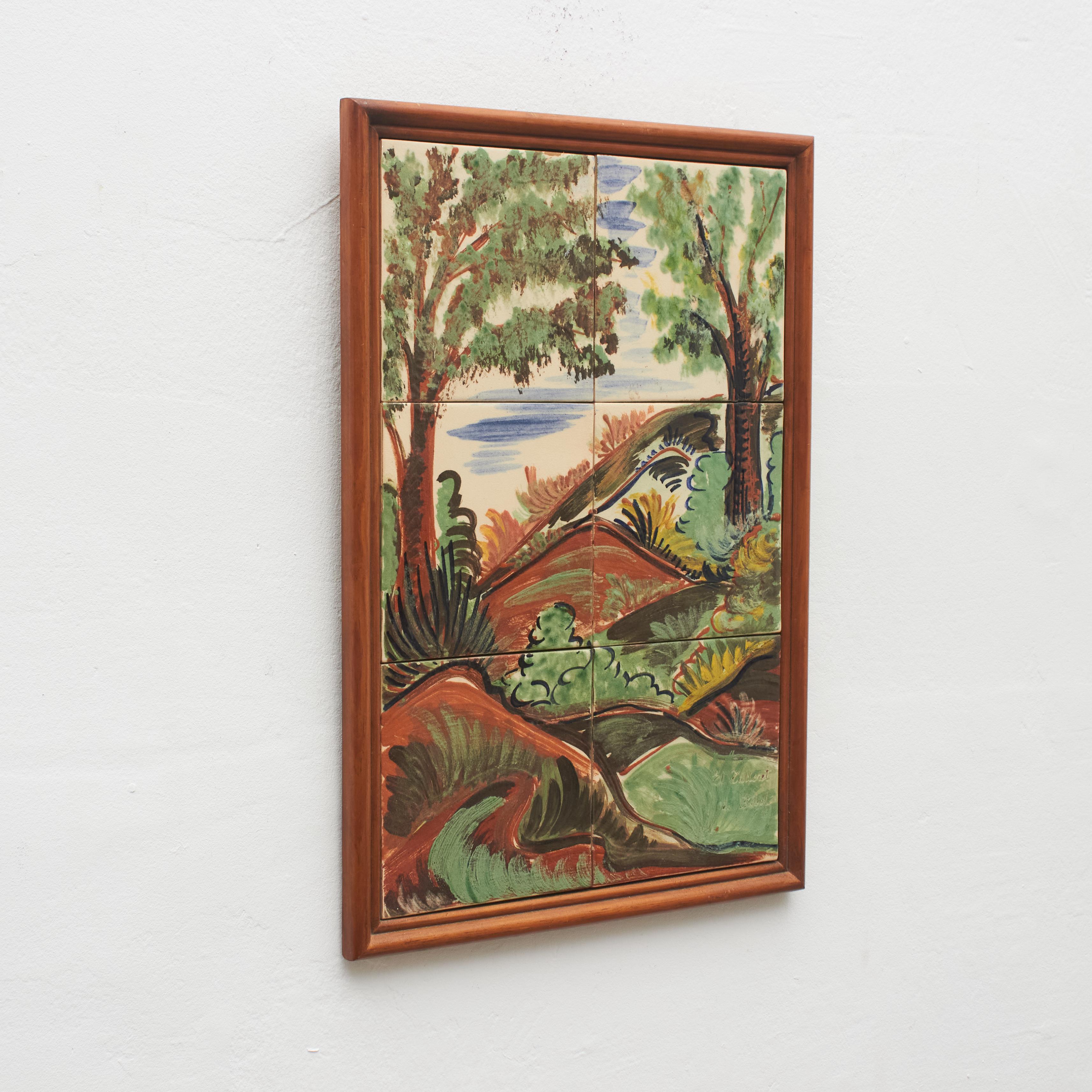 Ceramic hand painted artwork of a colorful landscape by Catalan artist Diaz Costa, circa 1960.
Framed.

In original condition, with minor wear consistent of age and use, preserving a beautiul patina.