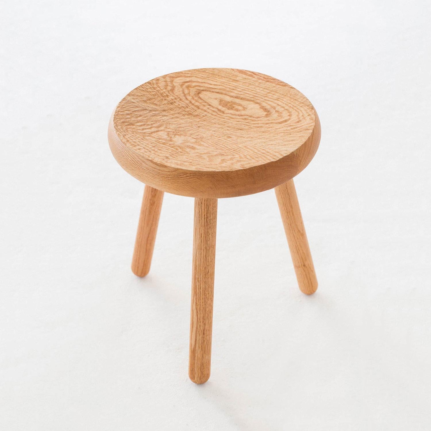 A versatile piece of furniture, the Dibbet Stool functions as an extra seat, ottoman, or side table. Reminiscent of Shaker or early frontier furniture, the thick seat is hand carved with a slight concave that leaves a tactile and smooth texture. The