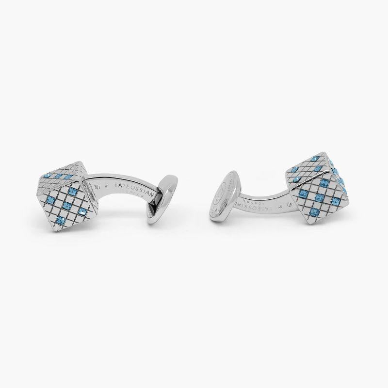 Dice cufflinks with blue montana Swarovski Elements

Sparkling Montana-coloured Swarovski elements are arranged to form the numbers of dice within an intricately engraved diamond pattern frame. Set in rhodium plated base metal, our playful design