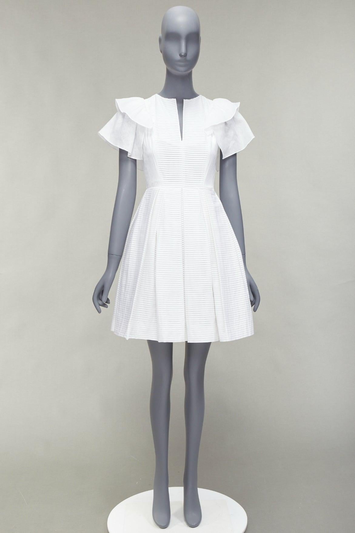 DICE KAYEK white pleated cotton ruffle sleeve fit flared cocktail dress FR34 XS
Reference: AAWC/A01147
Brand: Dice Kayek
Material: Cotton
Color: White
Pattern: Solid
Closure: Zip
Lining: White Fabric
Extra Details: Side zip.
Made in: