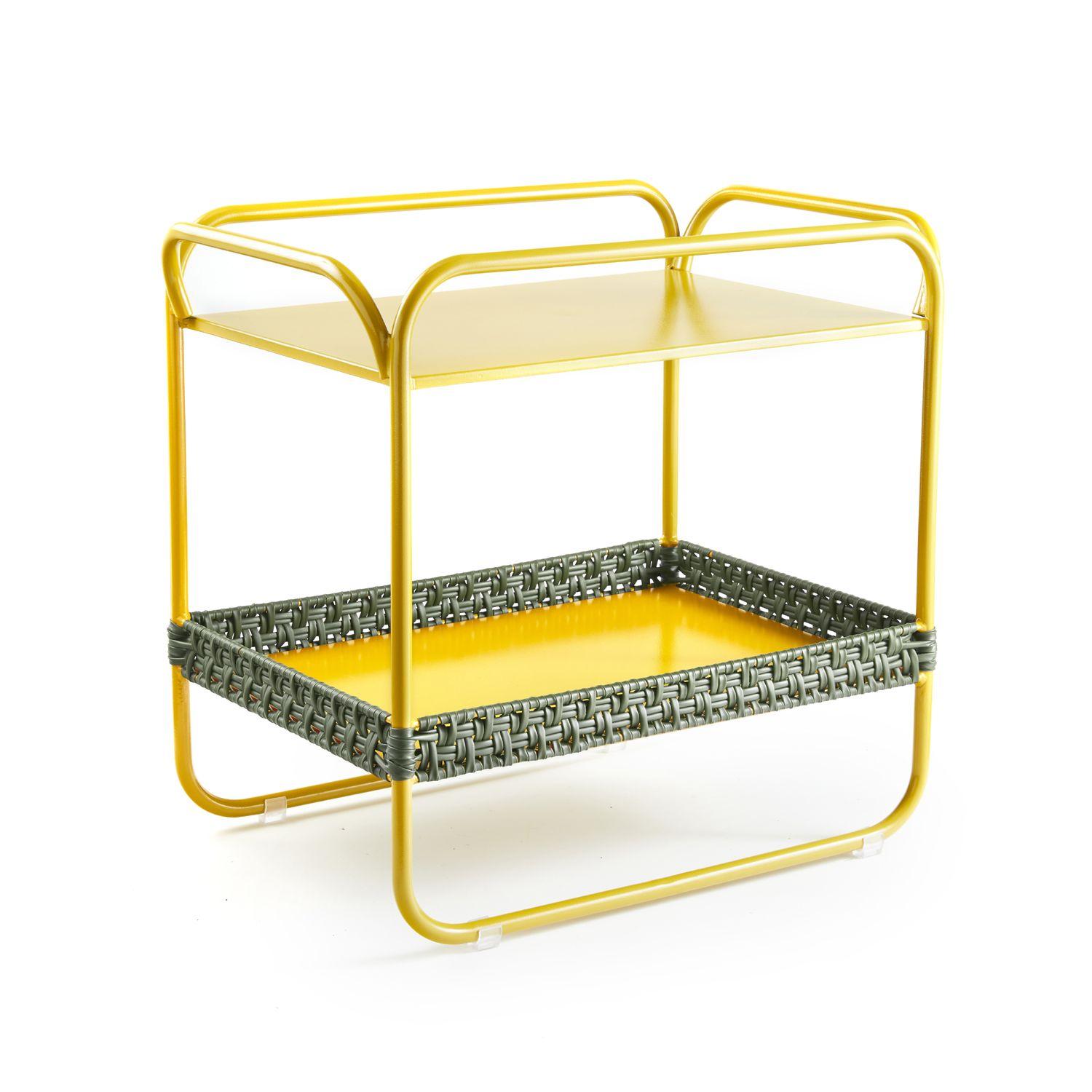 Dichas side table by Cristina Celestino. 
Materials: PVC strings made from recycled plastic, steel
Dimensions: D 55 x W 38 x H 55 cm 
Available in colors: curry yellow/black red, curry yellow/olive green.

The Dichas Side Table, designed by