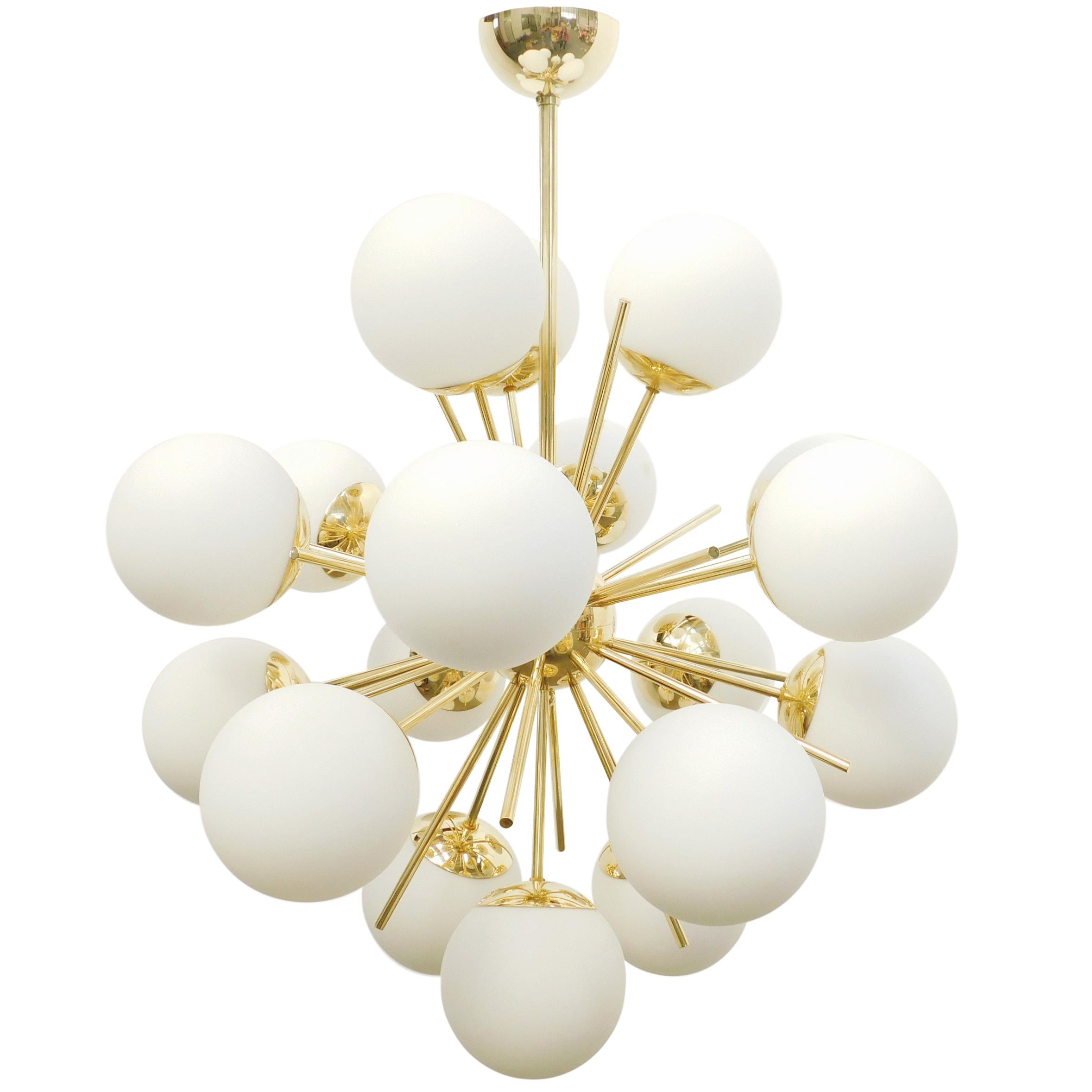 Italian sputnik chandelier with 18 Murano glass globes mounted on brass frame / Designed by Fabio Bergomi for Fabio Ltd / Made in Italy
18 lights / E12 or E14 type / max 40W each
Diameter: 29 inches / Height: 32 inches including rod and canopy
Order