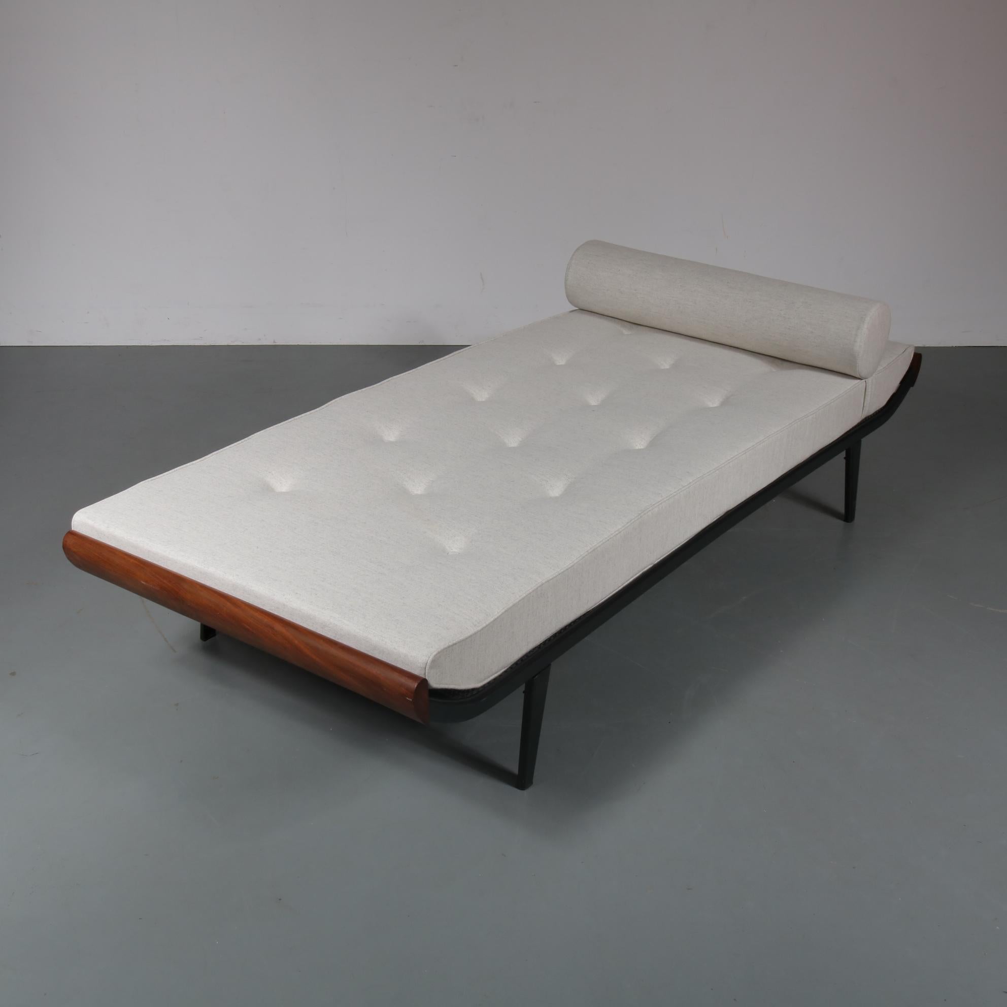 An outstanding Cleopatra daybed, designed by Dick Cordemeijer and manufactured by Auping in the Netherlands, circa 1954.

This eye-catching piece is made from the highest quality black lacquered metal with wonderful teak wooden ends. The