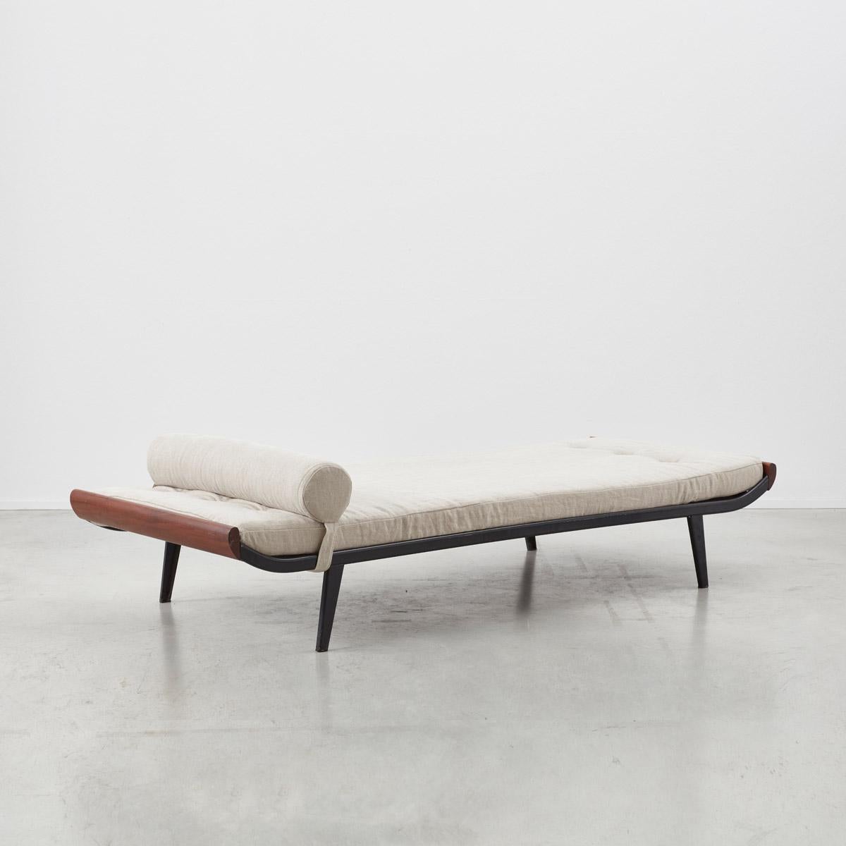 This Minimalist ‘Cleopatra’ daybed was designed by Dutch designer, Dick Cordemeijer, for Auping. Minimalist clean lines. Metal frame with mattress and a pleasing bolster with detachable strap. Legs unscrew for easy install. We can usually source