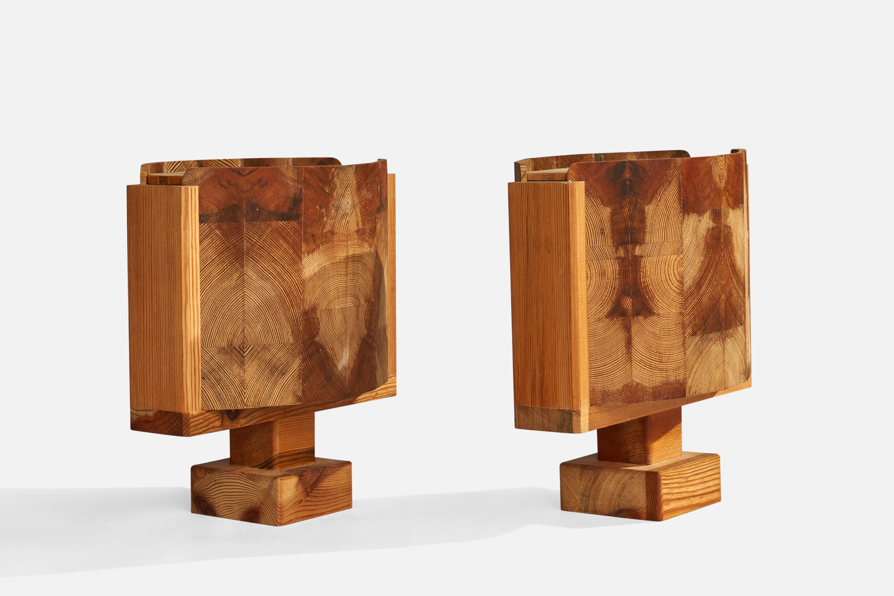 A pair of sizeable pine and spalting table lamps designed and produced by Dick Degerfeldt, Sweden, dated 1984.

Overall Dimensions (inches): 11.75” H x 11.25” W x 7” D
Stated dimensions include shade.
Bulb Specifications: E-14 Bulb
Number of
