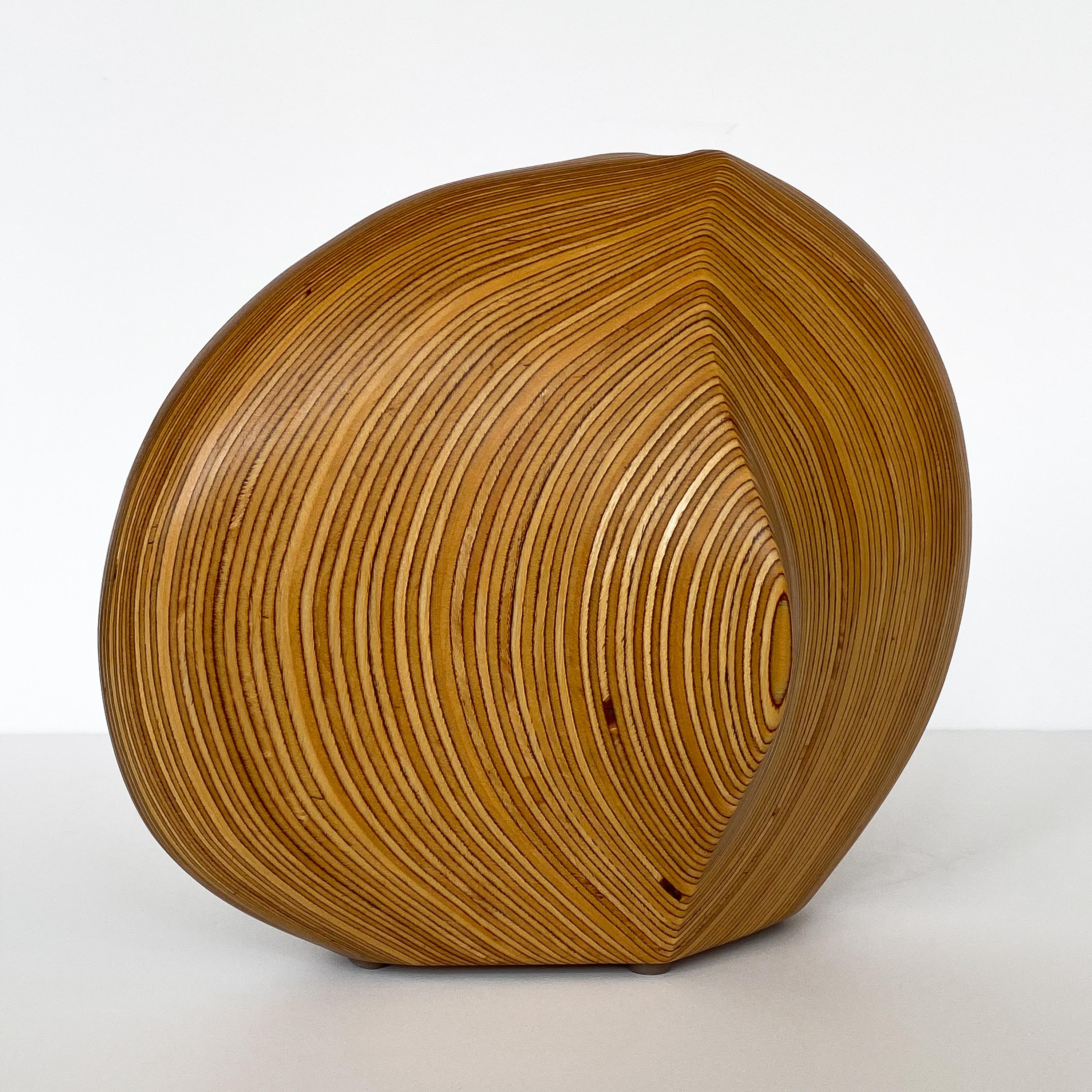 Hand carved laminated wood sculpture / vessel by Dick Shanley, circa 1970s. Laminated wood carved into an abstract, modern and fluid organic form with 5/8