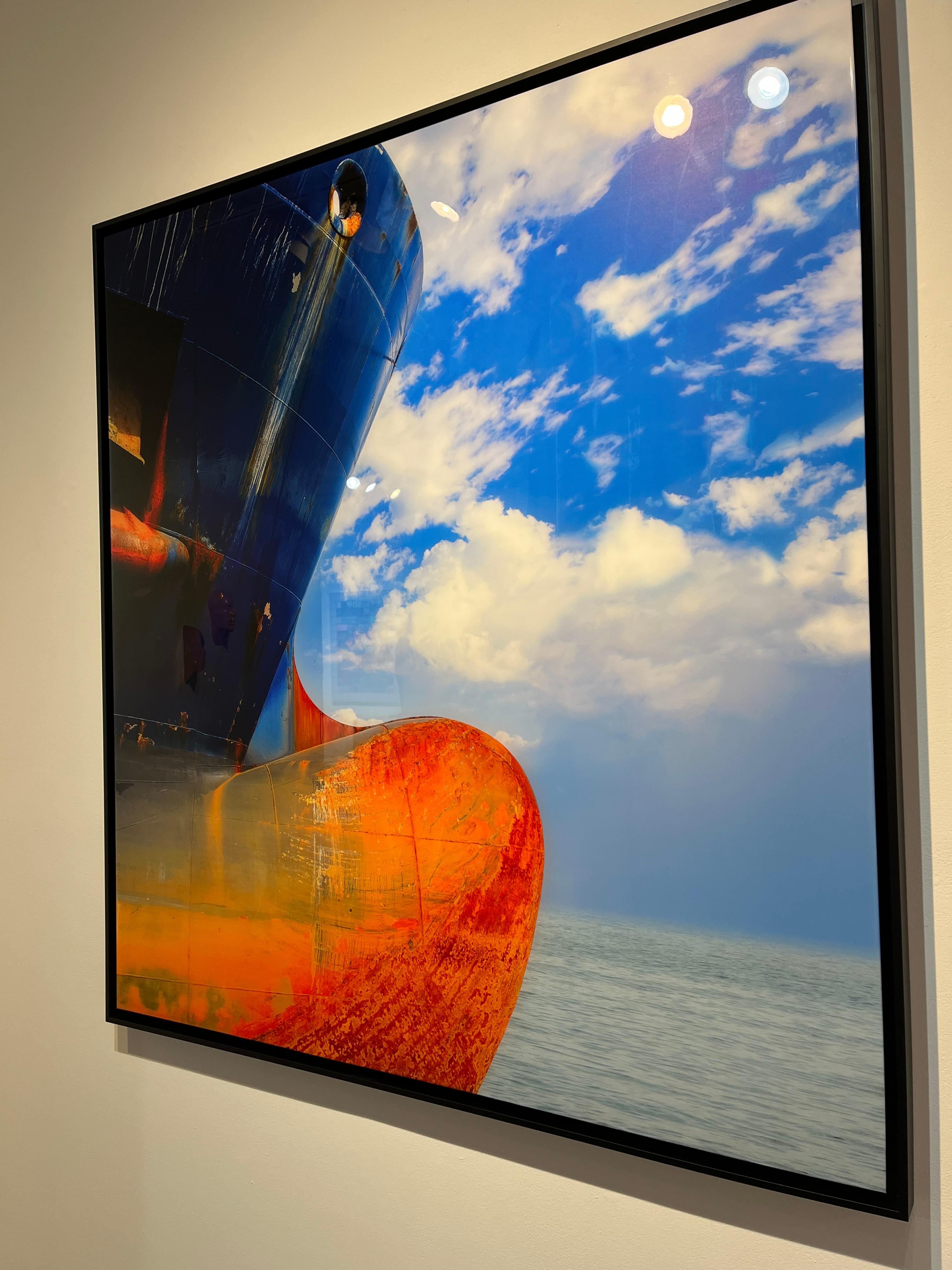 This photograph is printed on archival pigment paper and encased in resin. It is placed in a black float frame. 
It is part of a limited edition of 8 and 2 artist proofs, all sizes included. 

It is available in two sizes, 
120 x 140 cm (47 x 55