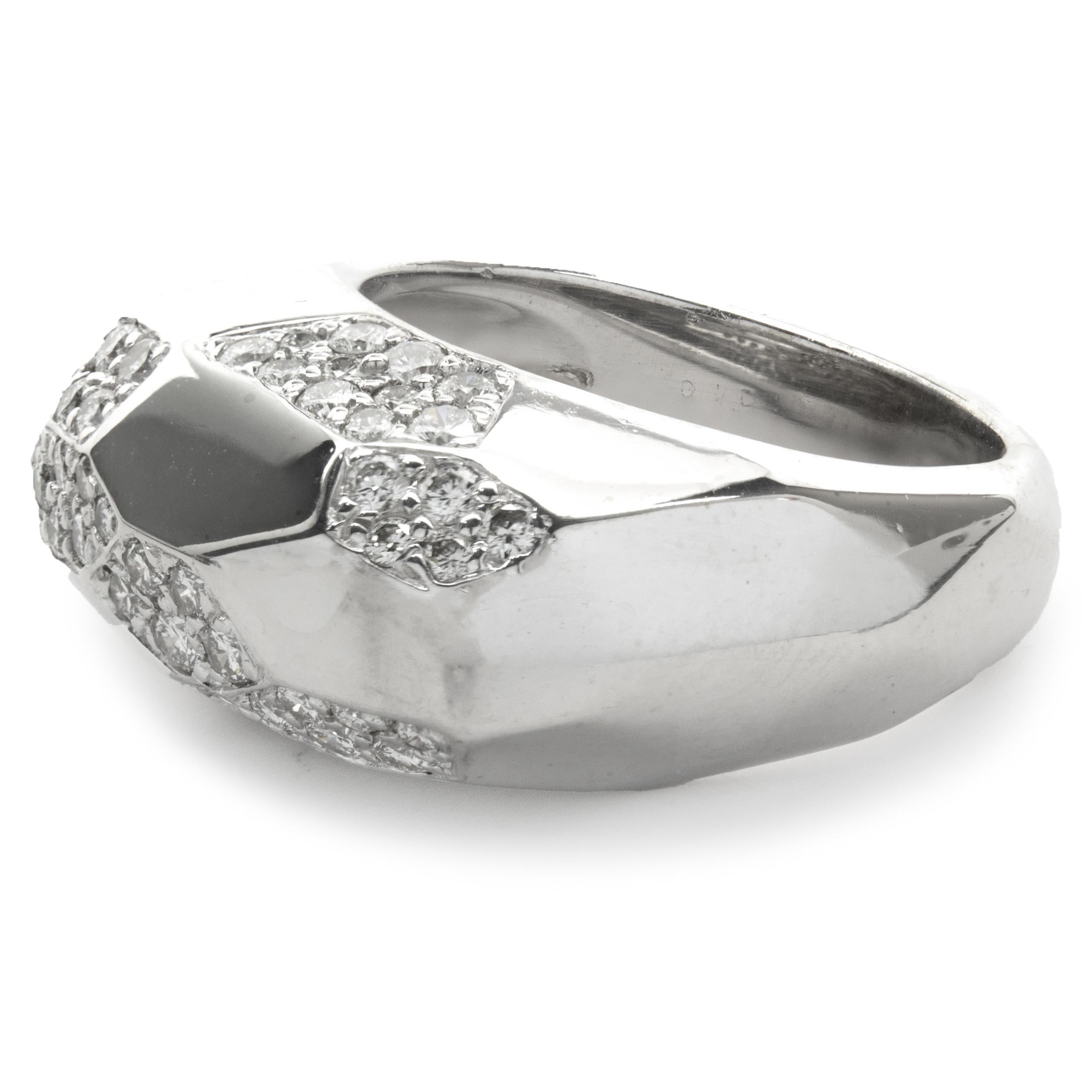 Designer: Didier Guerin
Material: platinum
Diamond: 48 round brilliant cut= .96cttw
Color: G
Clarity: VS1
Ring Size: 7 (please allow two additional shipping days for sizing requests)
Dimensions: ring top measures 10.16 X 23.23mm
Weight: 14.7 grams

