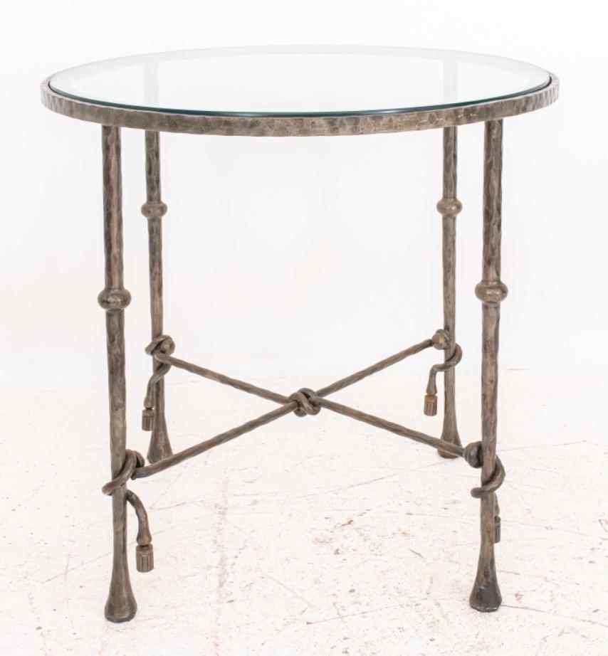 Diego Giacometti (Swiss, 1902-1985) manner cast iron gueridon or round side table with glass top raised on four tapered legs chased in the manner of the 