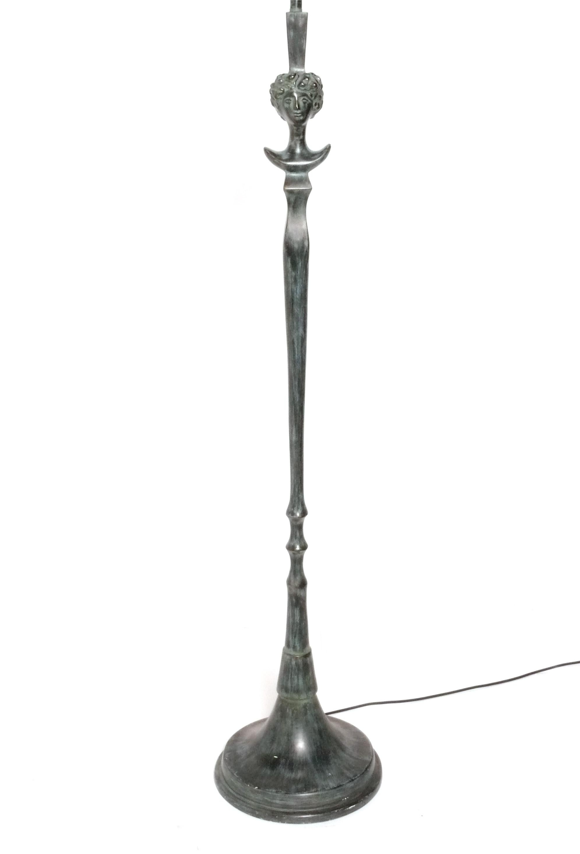 Sculptural Tete De Femme Floor Lamp, in the manner of Diego Giacometti, circa 1970s. This is probably an unauthorized casting from the 1970s. It has a warm verdigris bronze finish over the metal. It has been rewired and is ready to use. The height