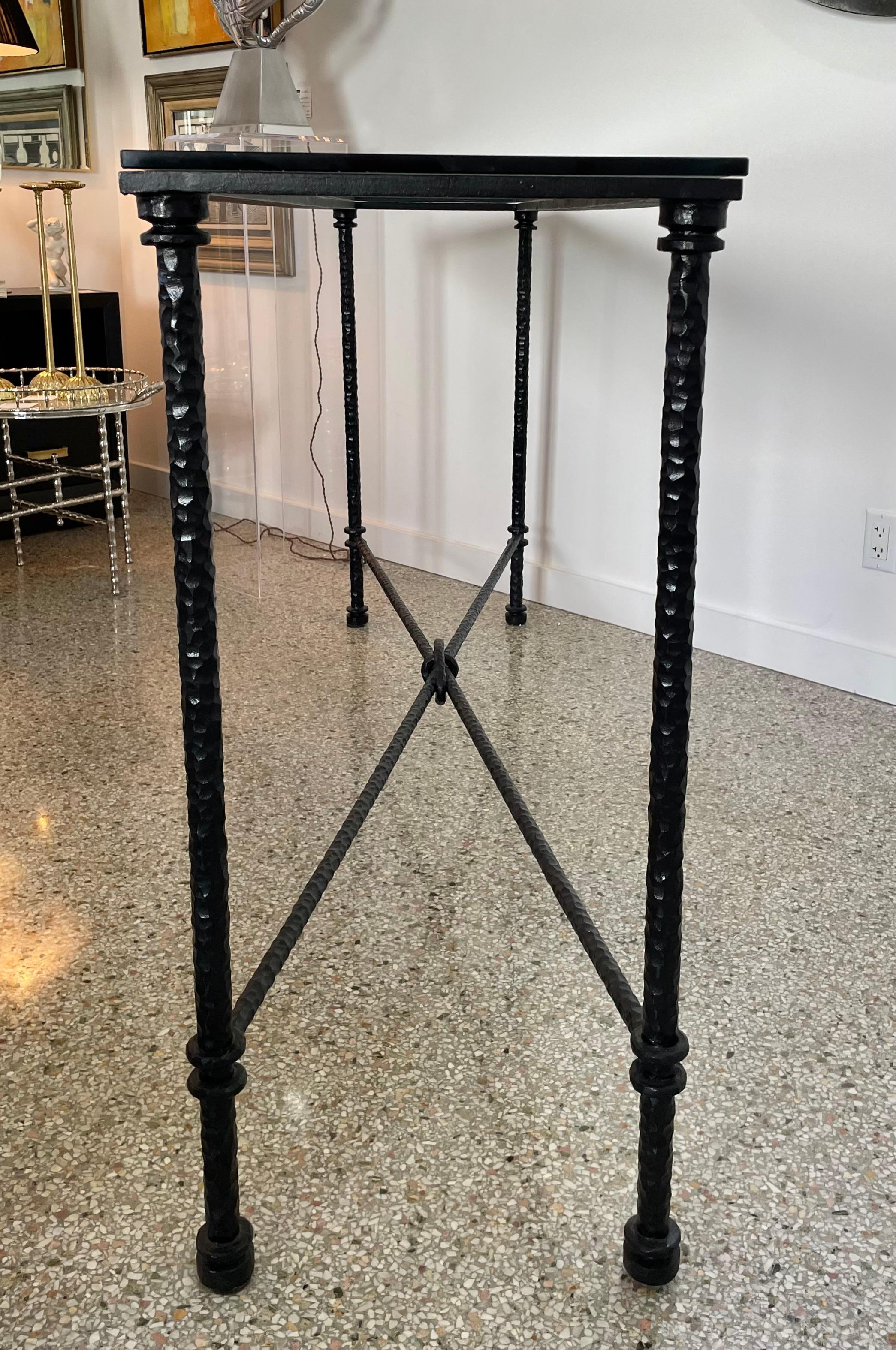 This stylish and chic artisan wrought iron console is very much in the manner of pieces created by Diego Giacometti. 

Note: Glass is .38