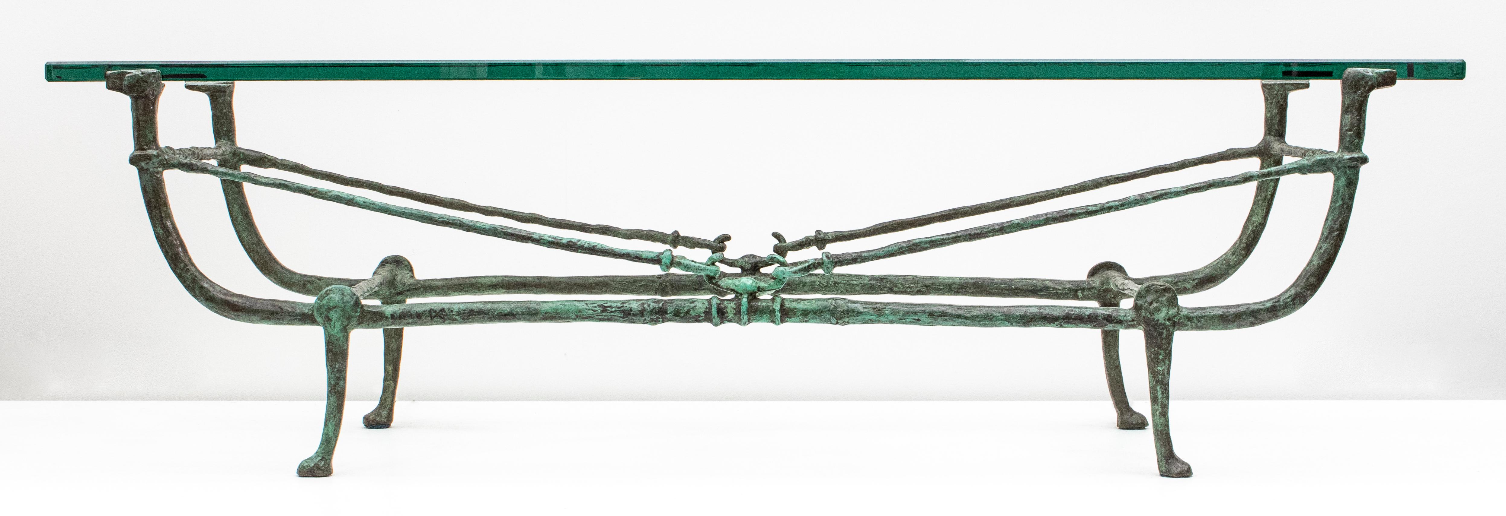 Diego Giacometti (Swiss, 1902-1985), 'Table berceau,' seconde version, low table, patinated bronze and glass, designed circa 1965, stamped signature: 