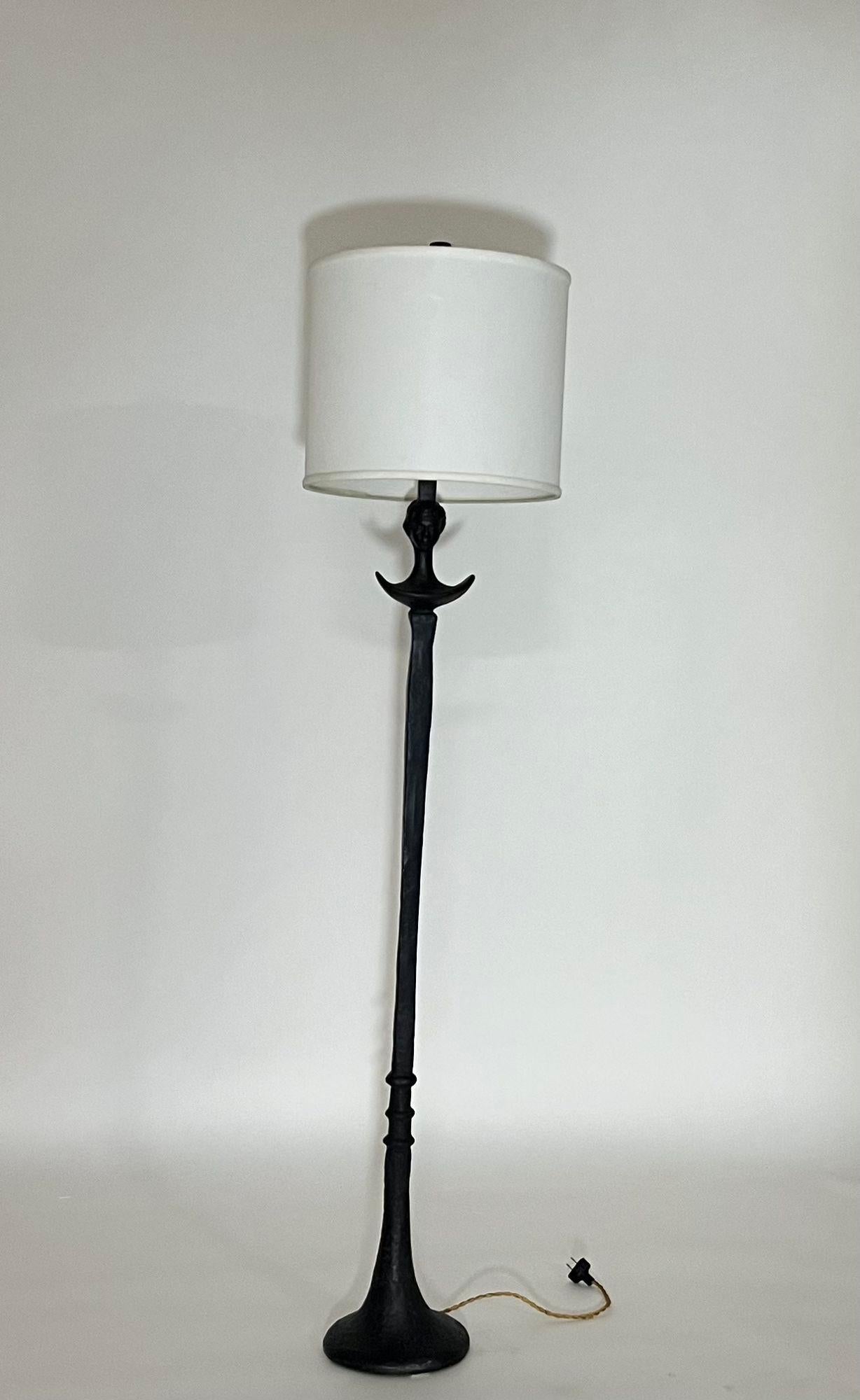 Diego Giacometti tete de femme bronze/noir lampadaire.
