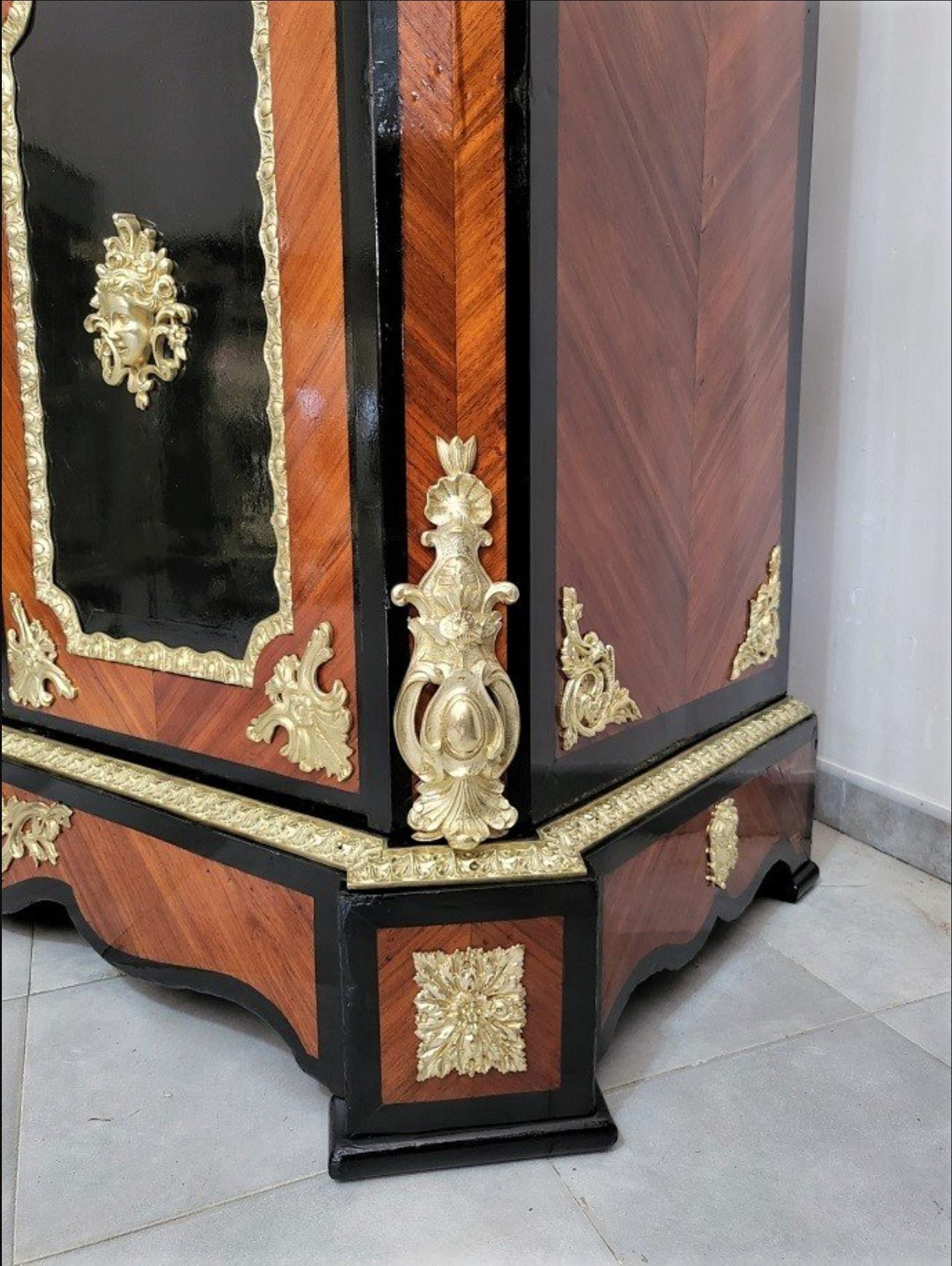Stunning living room Armoire or bedroom wardrobe signed by the famous cabinetmaker Charles Guillaume DIEHL in Napoleon III Boulle style . Very rich ornementations in Bronze, huge impressive 65cm long Bronze cariathids, in Boulle marquetry in brass