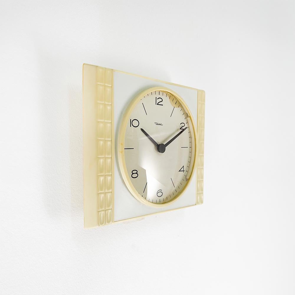 Diehl Wall Clock, 1960's

Plastic structure with glass sphere. 

Mechanical wind-up machinery. Made in Spain.

Measurements: 21x17x7 cm.
