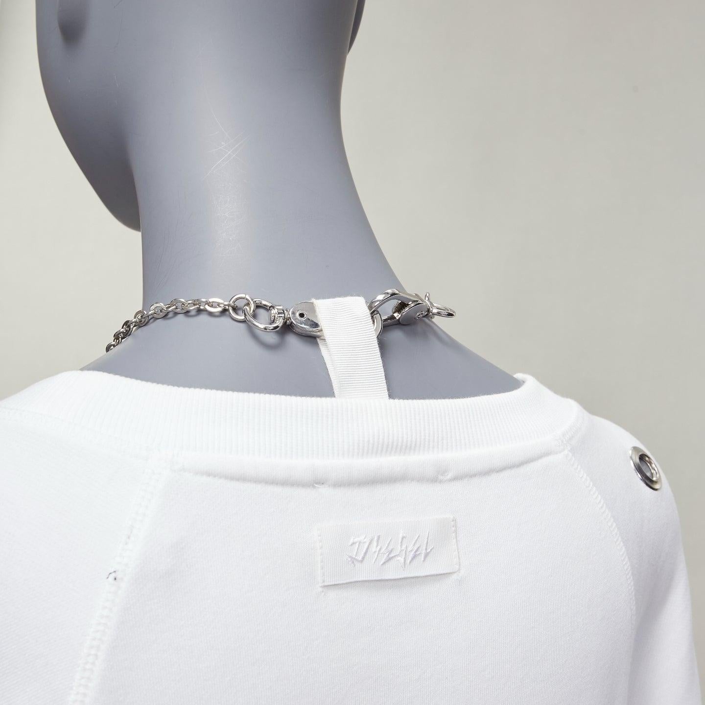 DIESEL 2023 Glenn Martens white silver punk chain grommet oversized sweatshirt XS
Reference: AAWC/A01134
Brand: Diesel
Collection: 2023
Material: Cotton
Color: White, Silver
Pattern: Solid
Closure: Pullover
Extra Details: Logo at back with some