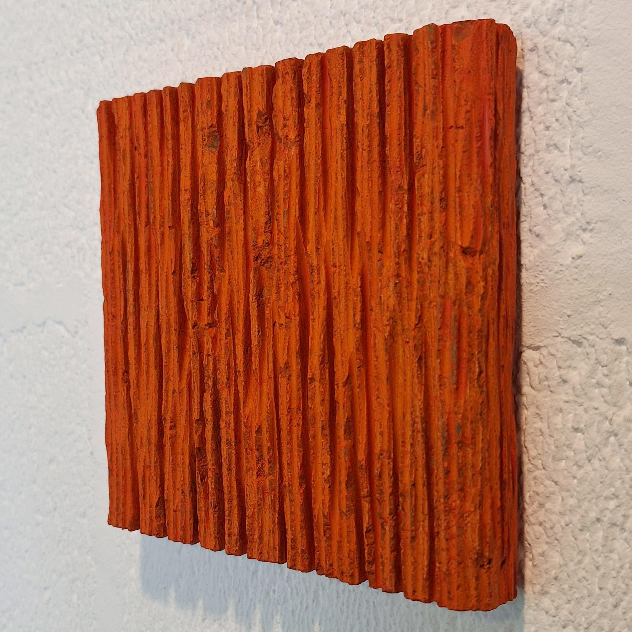 o.T. (OR15LV) is a unique small size contemporary modern wall sculpture painting relief by German artist Dieter Kränzlein. This sculpture relief is carved from a single block of limestone, treated with a thin layer of specially developed orange ink