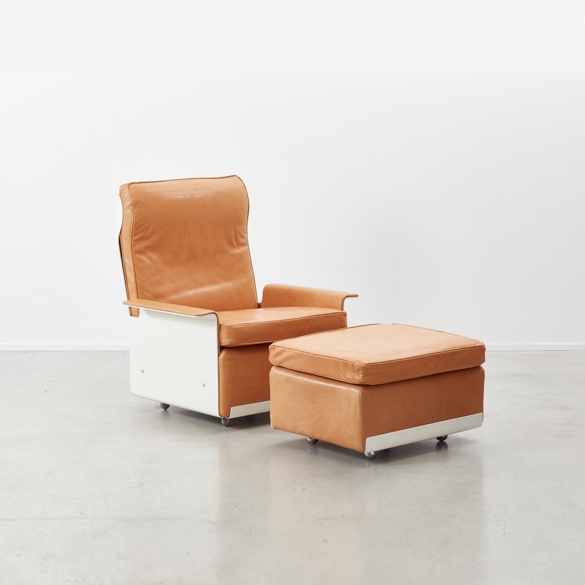 Dieter Rams 620 armchair and footstool, designed for Vitsoe in 1962. 
Newly reupholstered in buttery soft full grain aniline leather in a pale tan. Leather has a natural finish, with a slight nubuck feel. Will mark and patina with time. Frame,