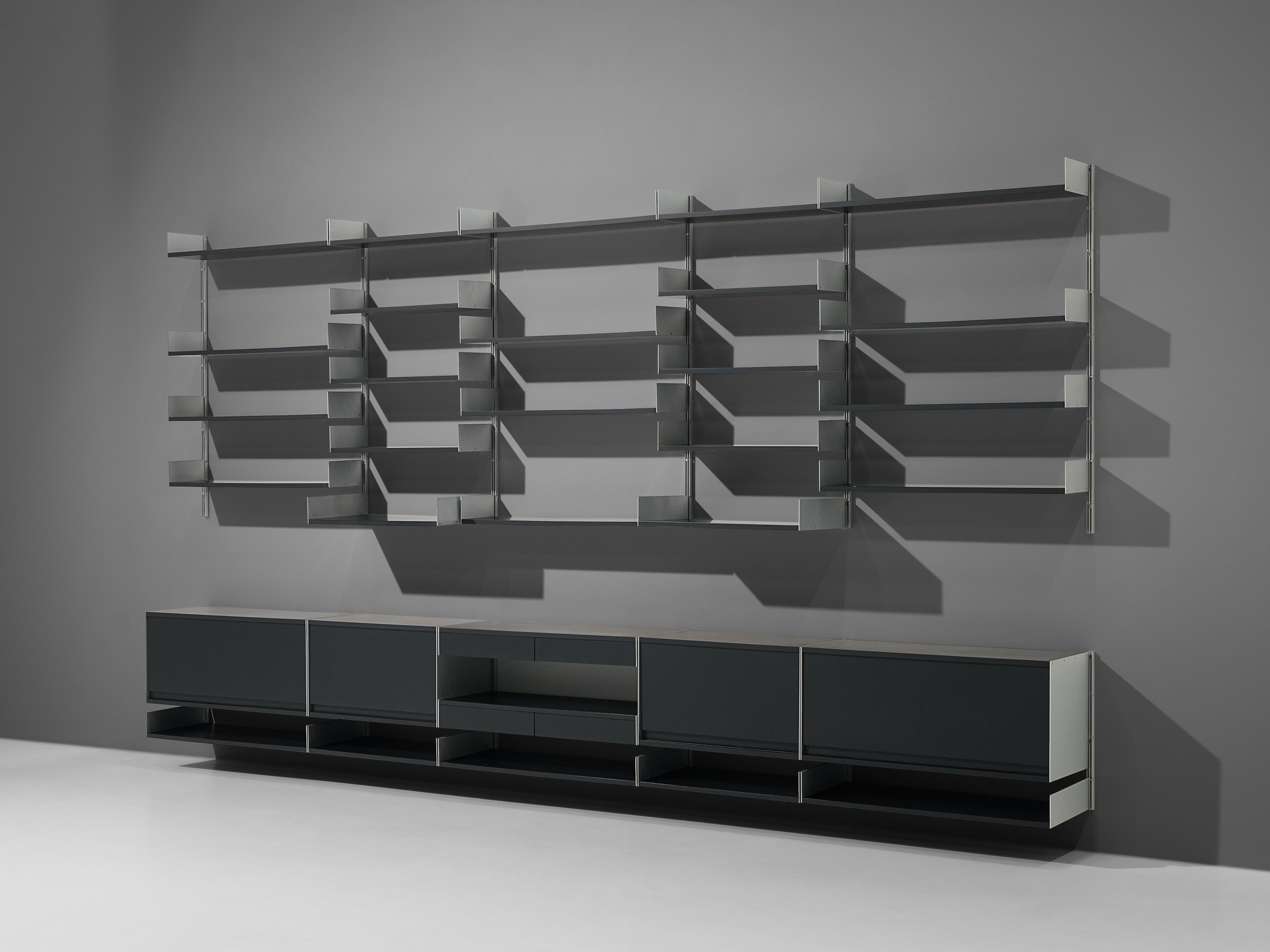 Dieter Rams for Vitsoe, wall unit model 606, aluminum, wood, Germany, design 1960

This grand wall unit is design by German product and furniture designer Dieter Rams. A sophisticated composition is created by the arrangement of shelves in two