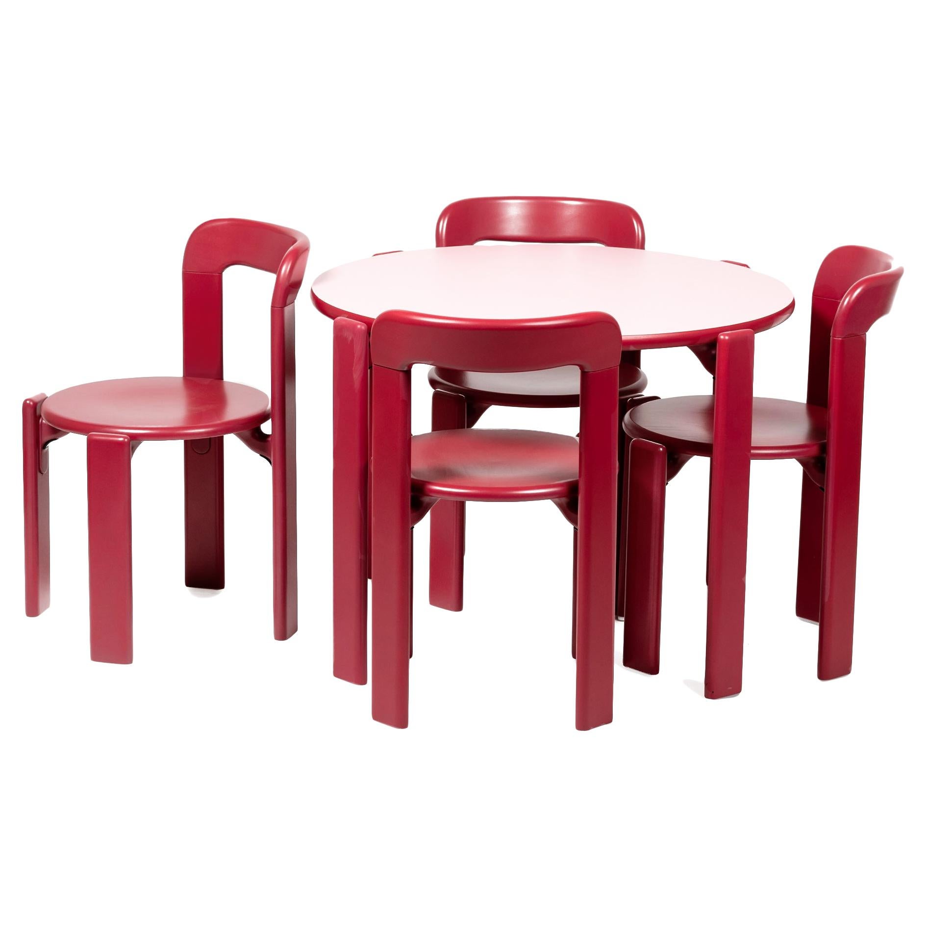 Ensemble Dietiker Rey Junior, table et chaises pour enfants en rose, conçu par Bruno Rey