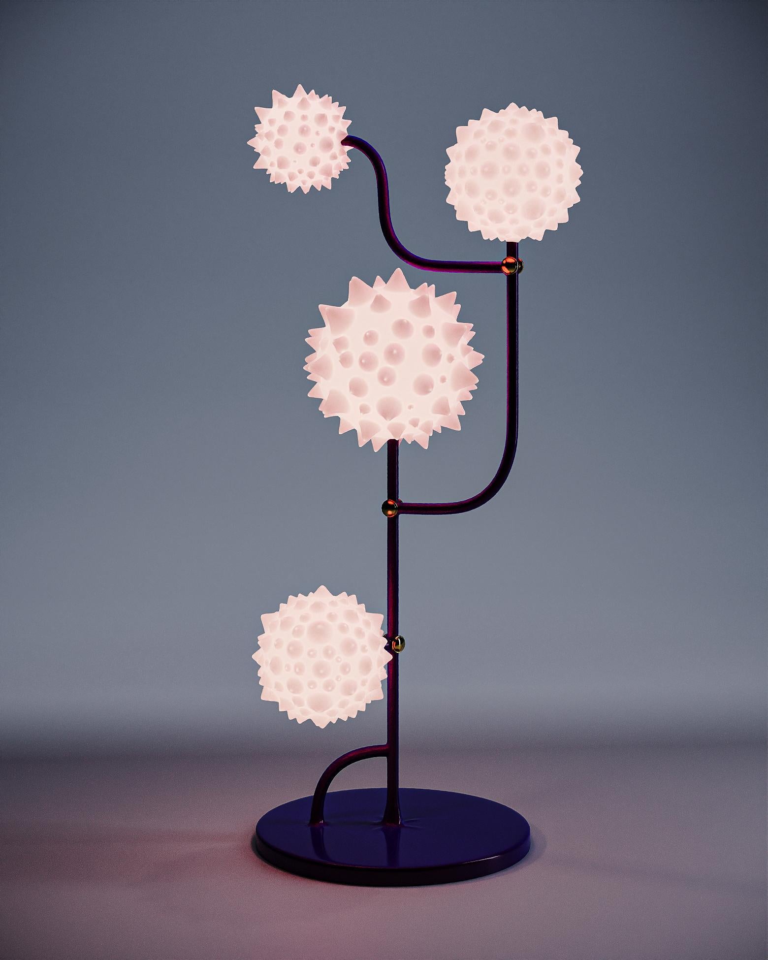 The spherical shapes of the new luminaire resemble blood cells, and the tubes leading to them — the vascular system through which they move.

Being a medical professional by education, designer Taras Yoom closely works with the theme of human