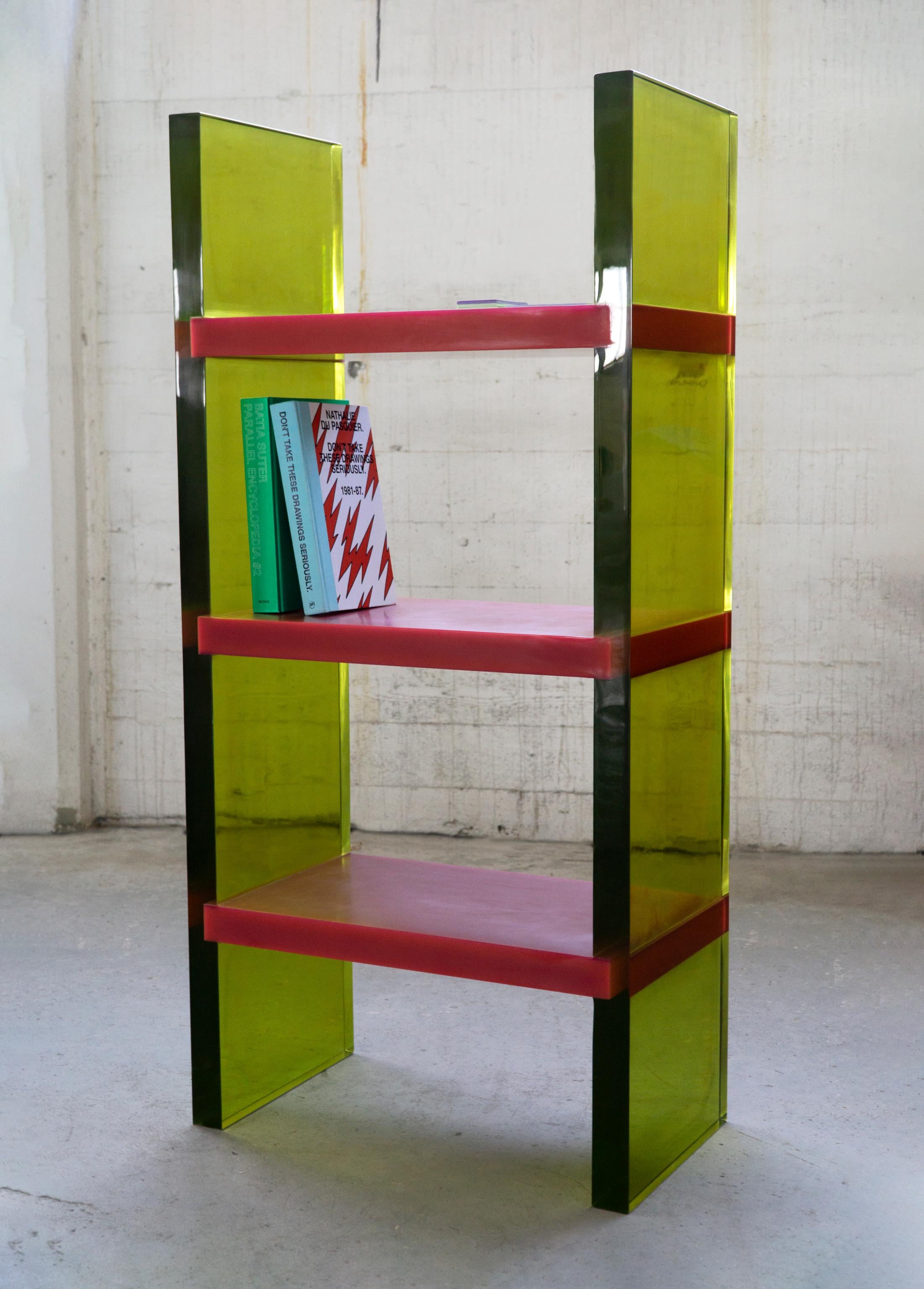 Differ Shelf by Lisa Brustolin
Dimensions: W 66 x D 44 x H 134 cm
Materials: Epoxy Resin

Differ Shelf is a bookshelf featured by high contrasts, the horizontality and verticality of the lines, the transparency of the epoxy resin for the legs while