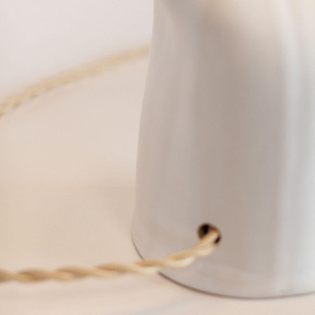 Contemporary 'Difforme' White Ceramic Table Lamp with Parchment Shade by Design Frères For Sale