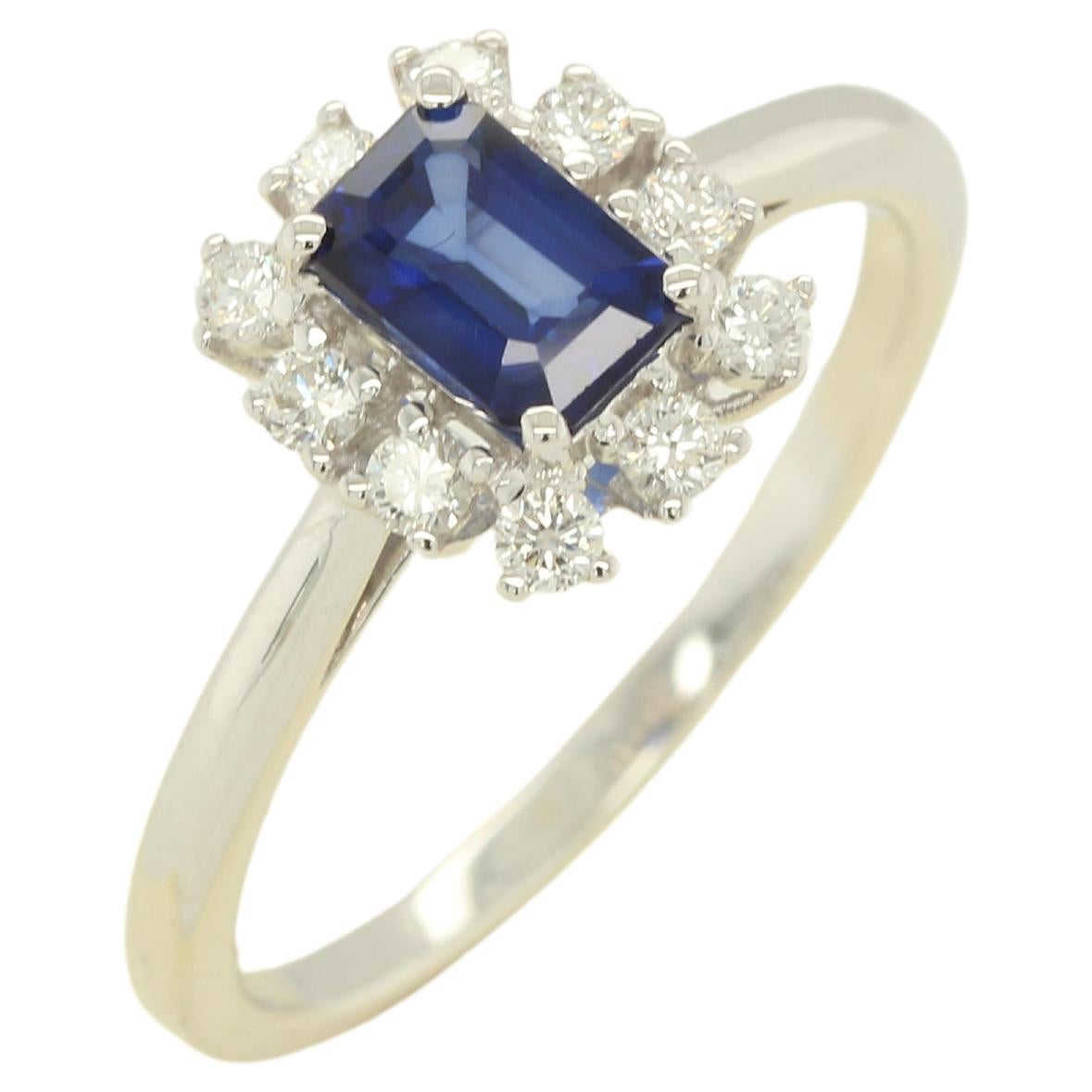 Bague Diffusion en or 18 carats avec saphir bleu et diamants en vente