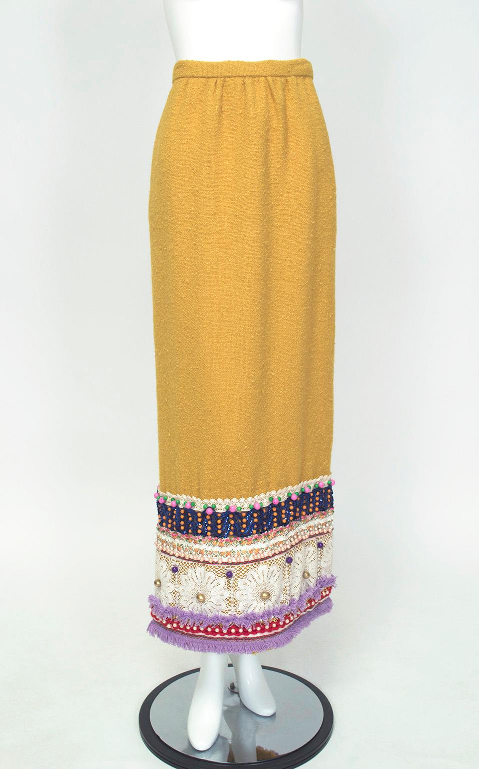 Understated it is not, but somehow this skirt—which looks like the result of a threesome between a bath mat, several doilies and your grandmother’s pearls—manages not to be gaudy.  Surprisingly, the mustard yellow acts as a neutral and pairs