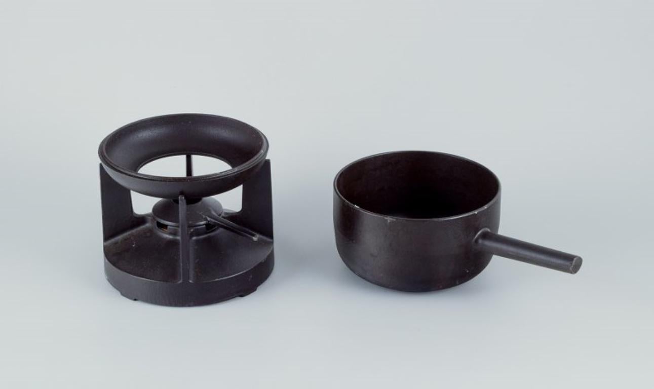 Danish Digsmed Design, Denmark. Cast iron fondue set. Bowls with enamel lining.  For Sale