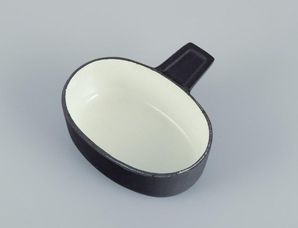 Iron Digsmed Design, Denmark. Cast iron fondue set. Bowls with enamel lining.  For Sale