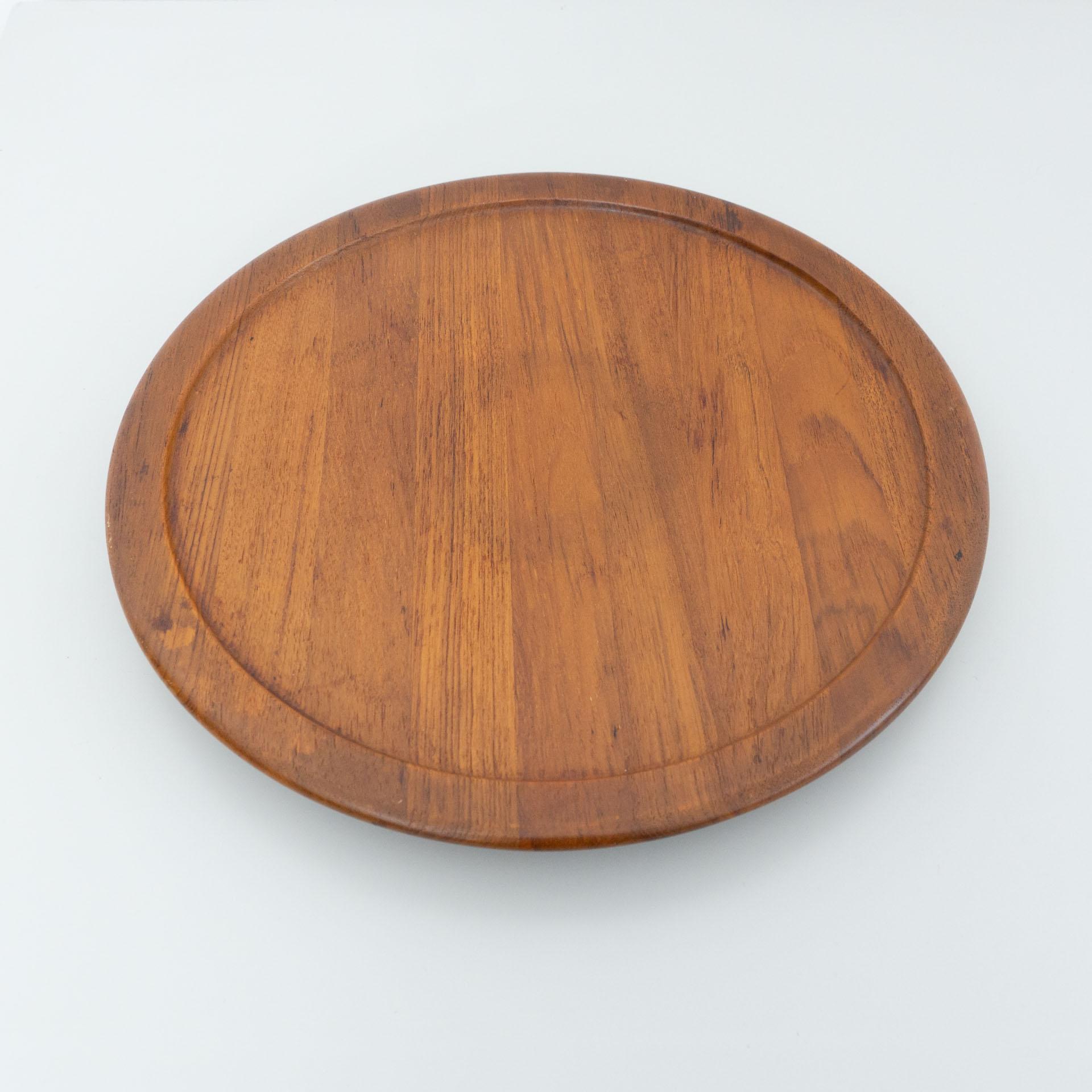 Swivel base by Digsmed, Denmark, circa 1960.

In original condition, with minor wear consistent with age and use, preserving a beautiful patina.

Material:
Wood

Dimensions:
ø 44.7 cm x H 4 cm.
