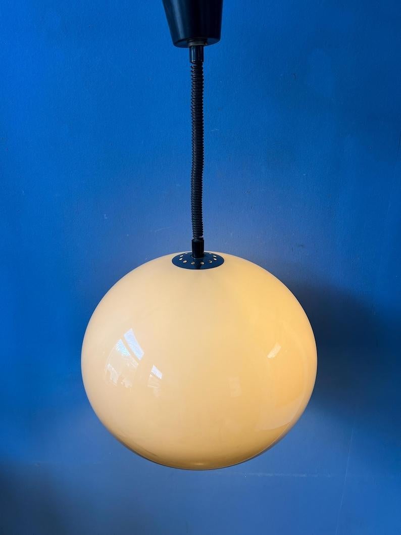 Classic space age mushroom pendant lamp by Dijkstra. The acrylic glass shade produces a magnificent glow. The height of the lamp can easily be adjusted with the suspension mechanism. The lamp requires an E27/26 (standard) lightbulb.

Additional