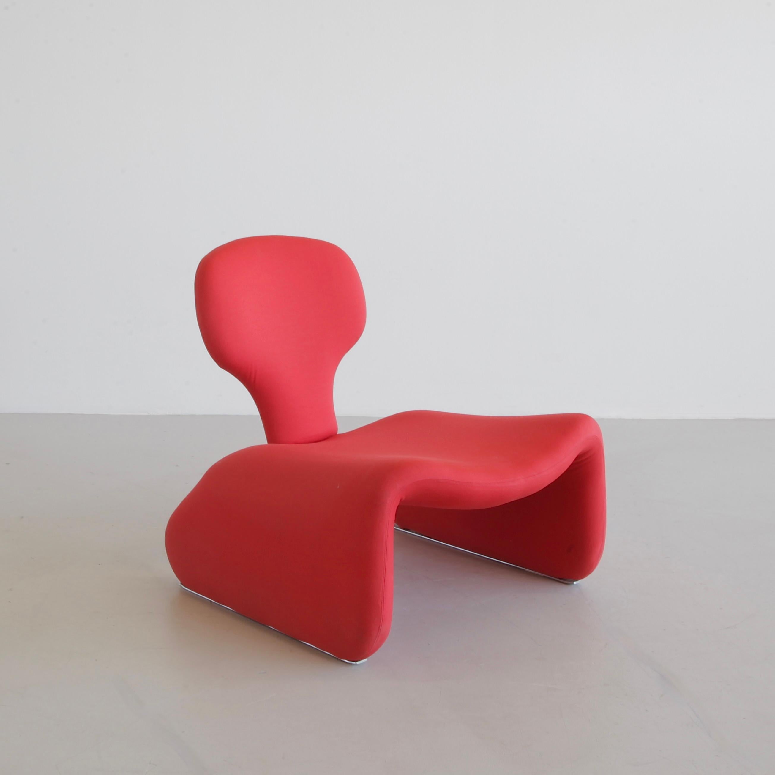 A set of the DIJNN Chair and Footstool in the original red stretch fabric. Metal construction with fabric and metal sliders.

The Djinn chair is one element of a series of Djinn furniture designed by noted French designer Olivier Mourgue. In 1965