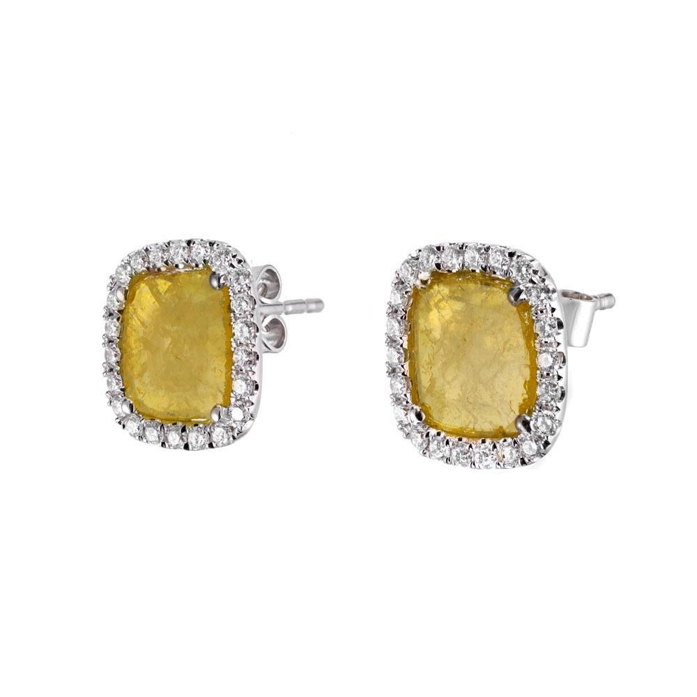 Designer Dilamani, Fancy natural yellow and white diamond earrings. 2 cushion shaped fancy yellow diamonds, each with a halo of white diamonds. Dilamani Cert# ex43820dx

2 cushion shape natural fine fancy yellow diamonds, crystal slices, rose cut