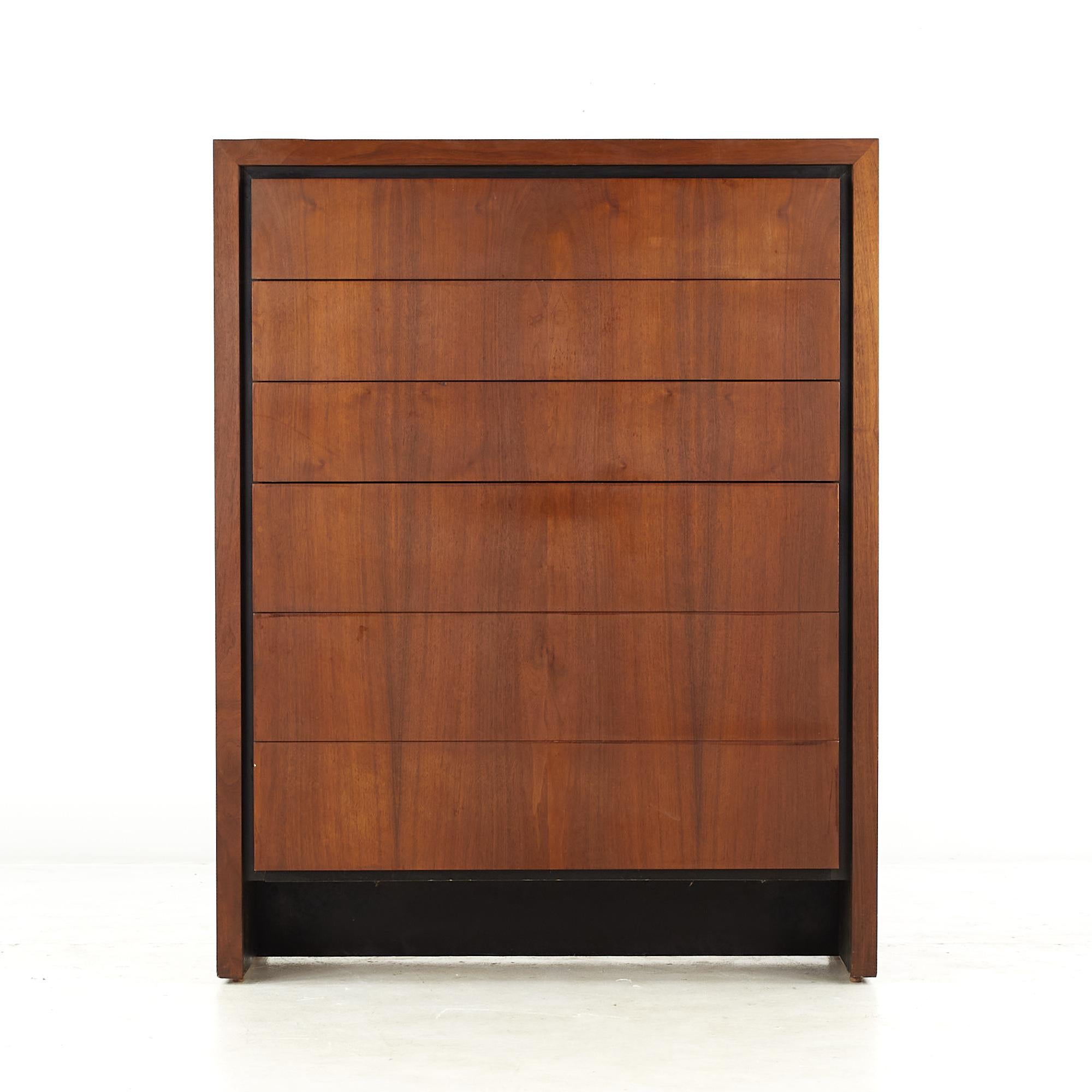 Dillingham Mid Century Bookmatched Highboy Dresser

This highboy measures: 38 wide x 19 deep x 48.5 inches high

All pieces of furniture can be had in what we call restored vintage condition. That means the piece is restored upon purchase so it’s