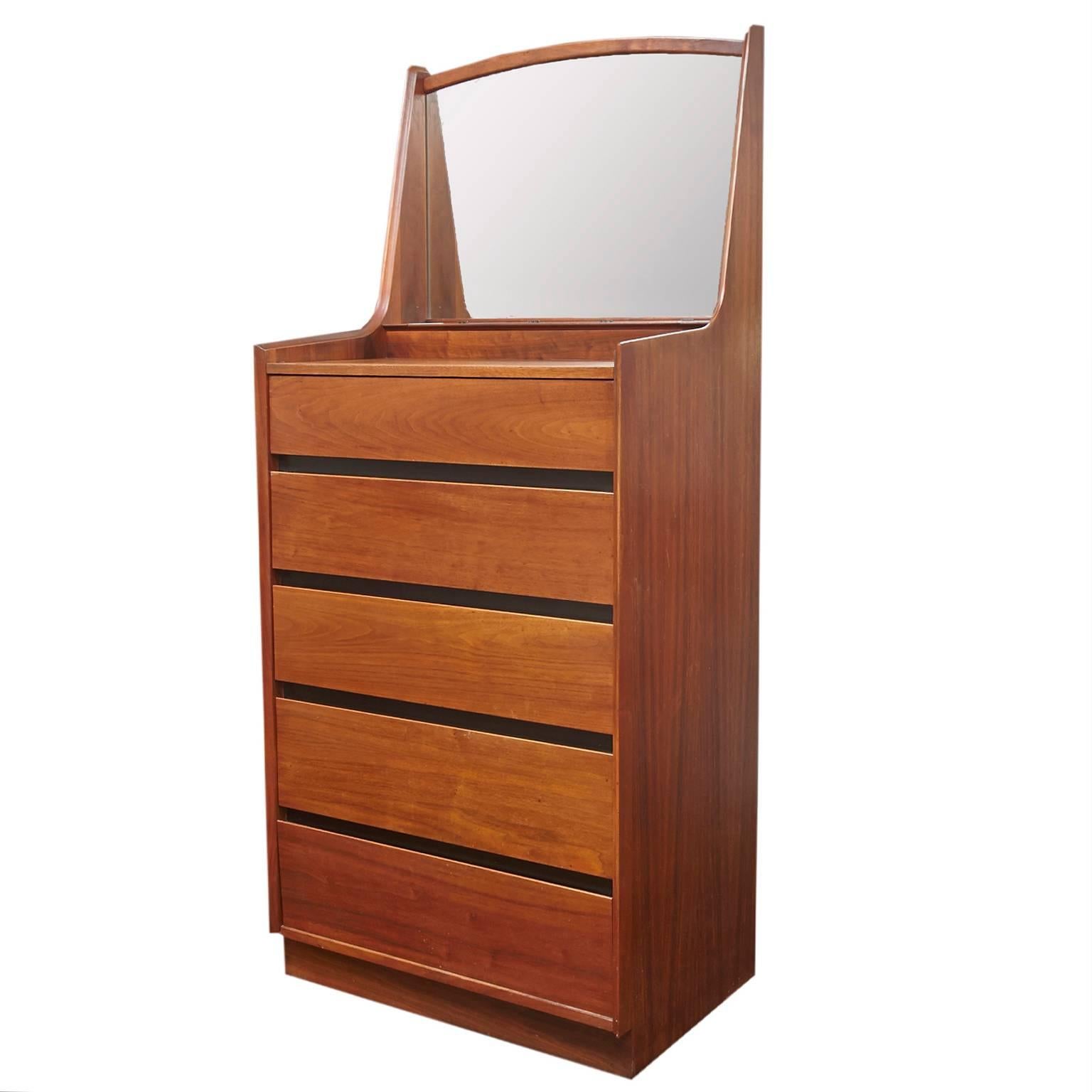 Dillingham Mid-Century Modern gentleman's dresser/highboy with built in mirror.
Designed by Merton Gershun for Dillingham. Lightly refinished. Has three compartments on top of dresser. Great addition to any style home.