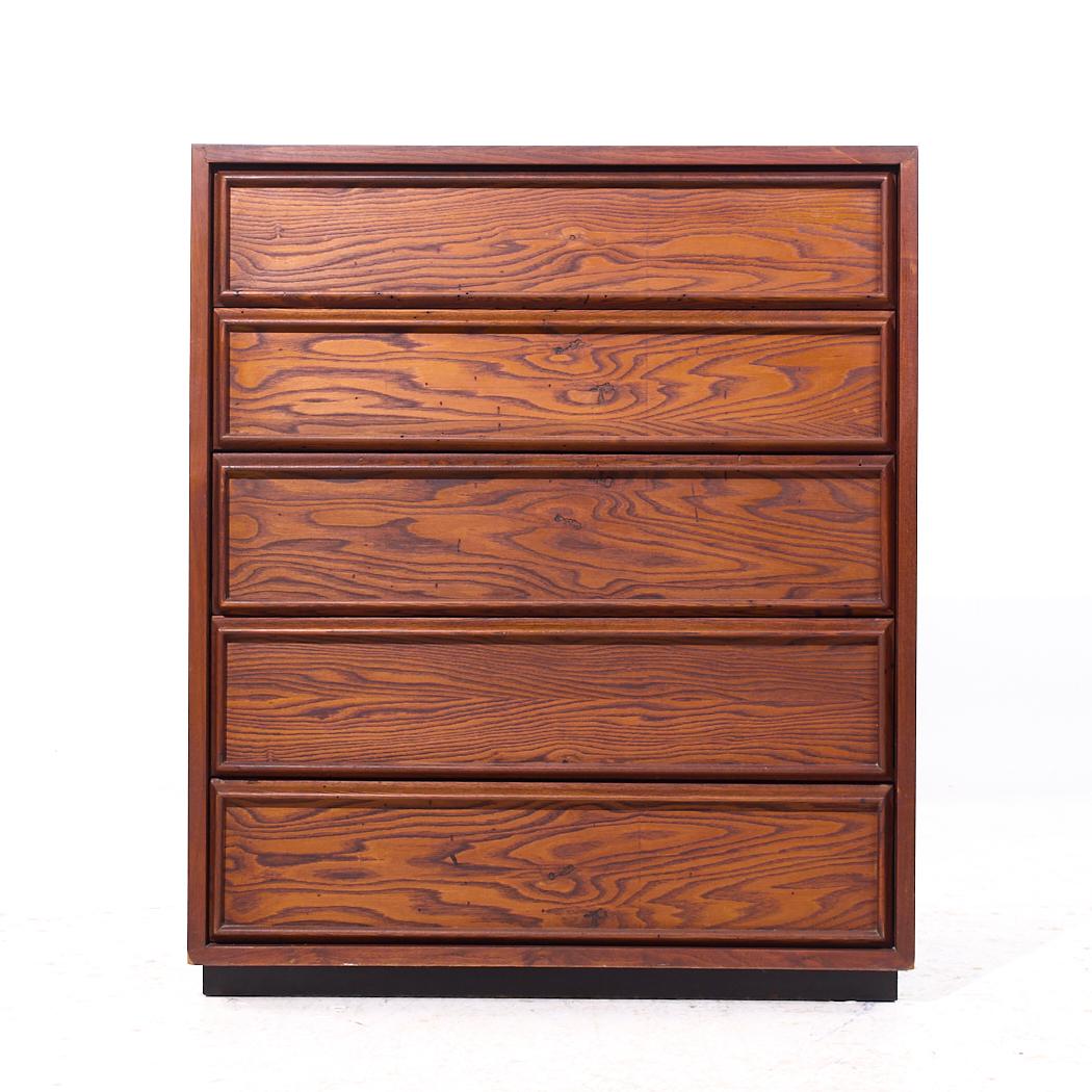 Dillingham Mid Century Pecky Cypress 5 Drawer Dresser

This highboy measures: 18 wide x 19 deep x 45 inches high

We take our photos in a controlled lighting studio to show as much detail as possible. We do not Photoshop out blemishes.

CONDITION: