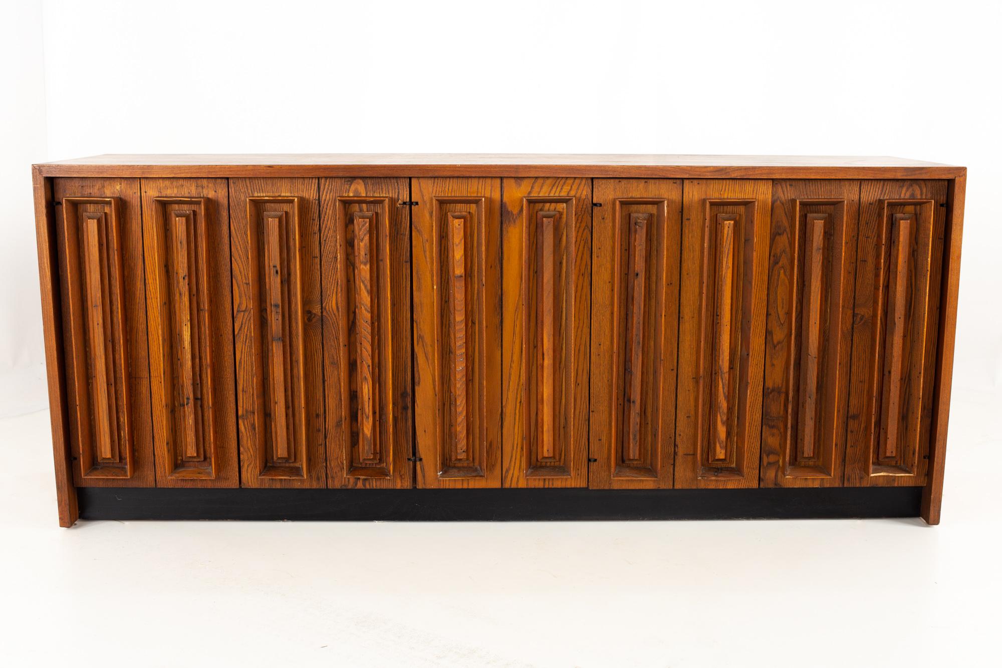 Dillingham midcentury pecky cypress and walnut sideboard credenza buffet

Measures: 74 wide x 19 deep x 30.5 high

This price includes getting this piece in what we call restored vintage condition. That means the piece is permanently fixed upon