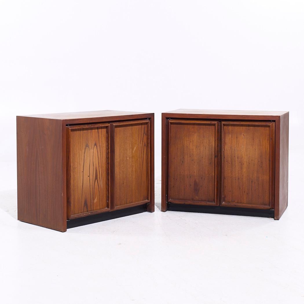 Dillingham Mid Century Pecky Cypress Nightstands - Pair

Each nightstand measures: 26 wide x 15 deep x 22 inches high

We take our photos in a controlled lighting studio to show as much detail as possible. We do not Photoshop out