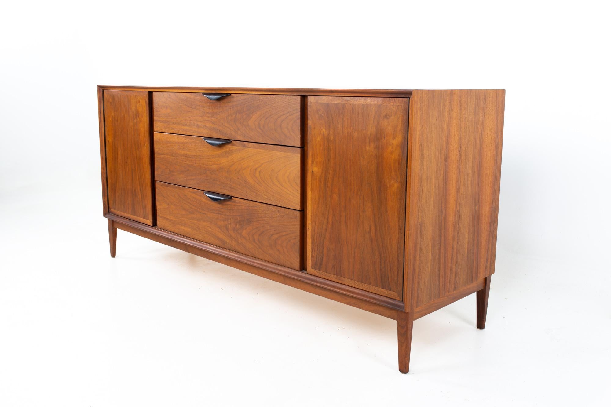 Dillingham mid century walnut sideboard buffet credenza
Credenza measures: 64 wide x 19 deep x 30.25 inches high

All pieces of furniture can be had in what we call restored vintage condition. That means the piece is restored upon purchase so