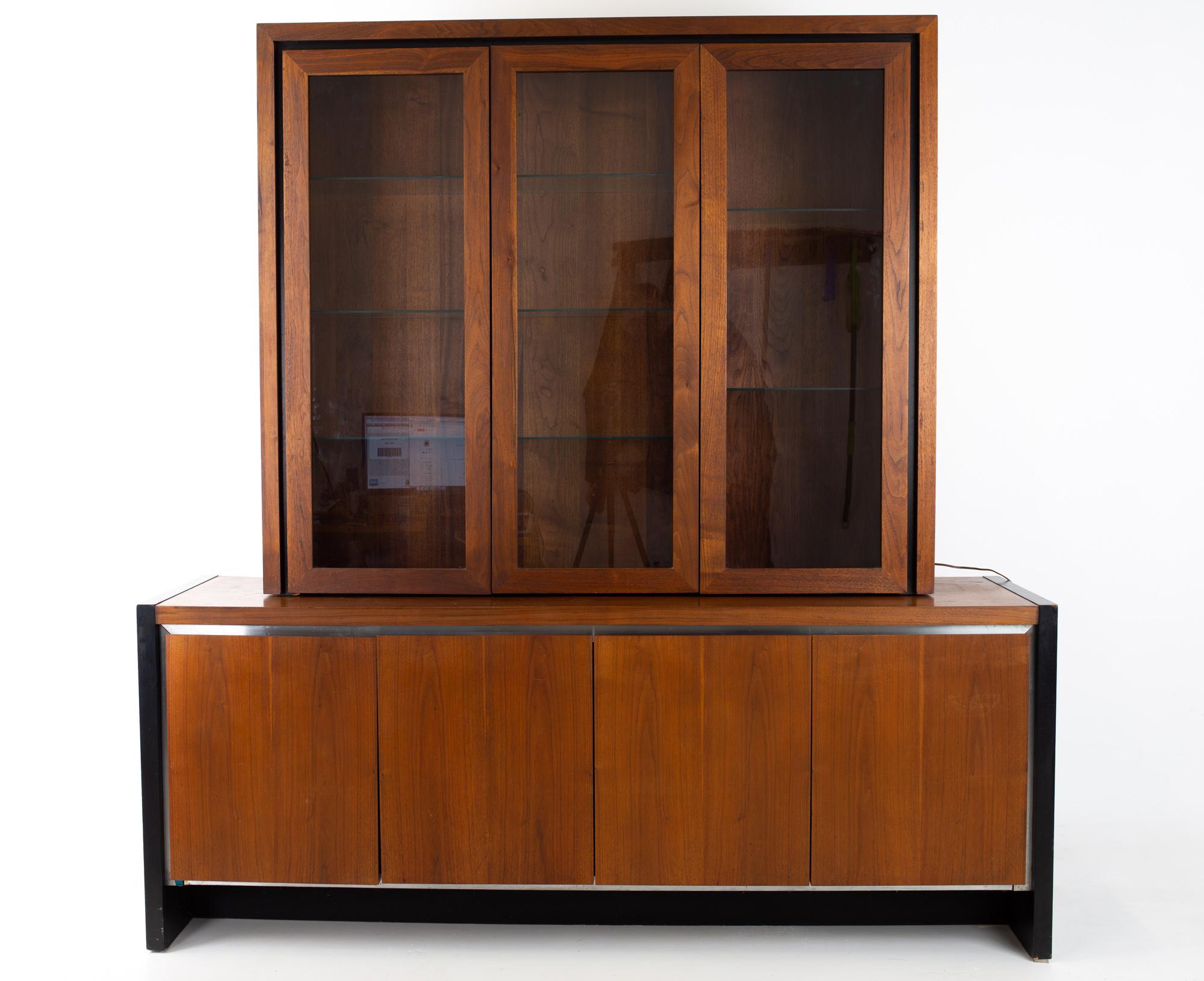 Dillingham Mid Century walnut buffet with hutch
Buffet and hutch measure: 74 wide x 19 deep x 77 inches high

This price includes getting this piece in what we call restored vintage condition. That means the piece is permanently fixed upon purchase