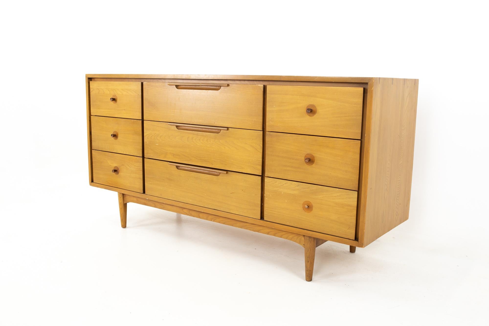 Dillingham Samara Mid Century walnut 9 drawer lowboy dresser
Dresser measures: 60 wide x 18.5 deep x 30.25 inches high

All pieces of furniture can be had in what we call restored vintage condition. That means the piece is restored upon purchase so